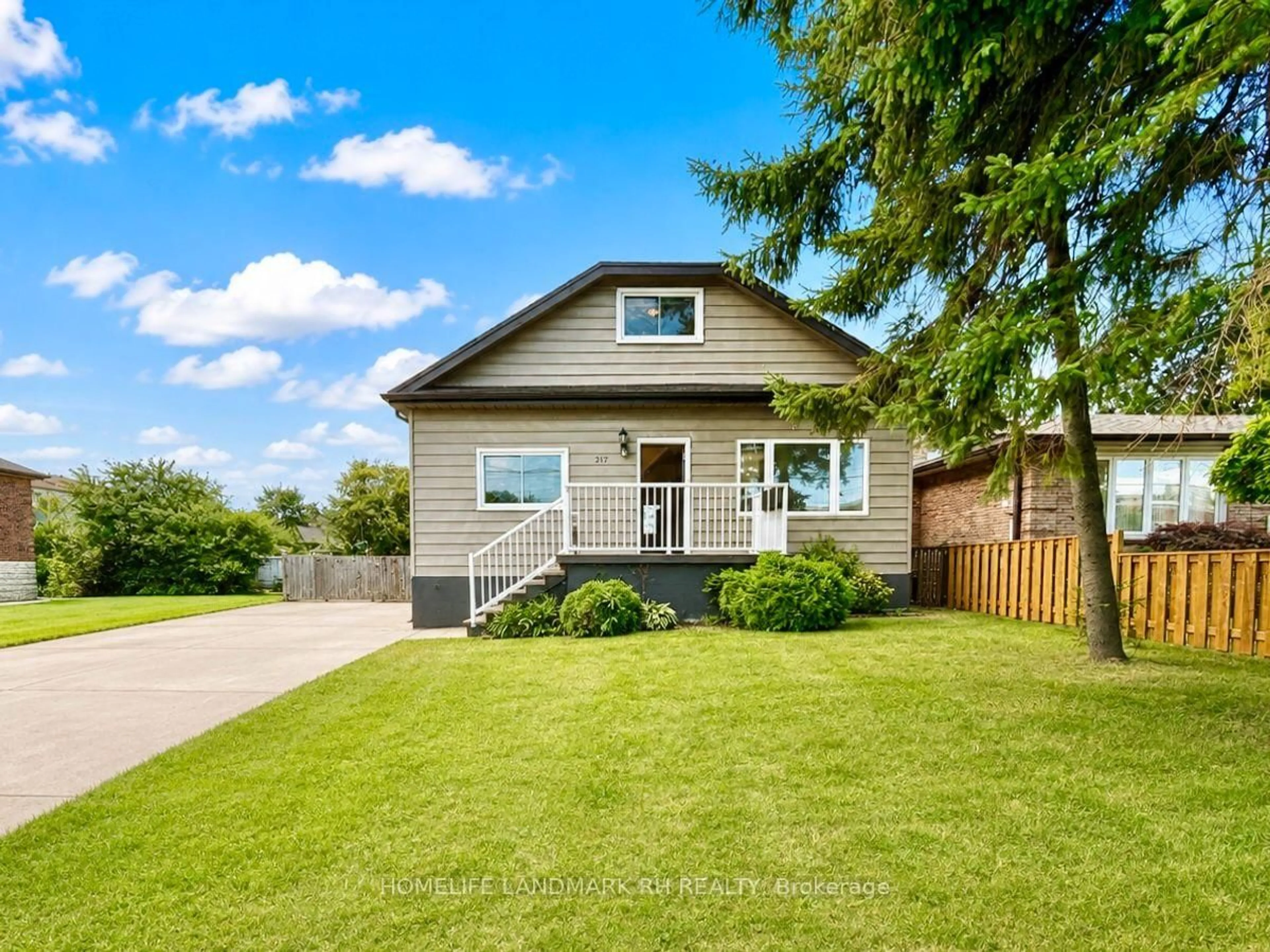 Home with vinyl exterior material, street for 217 Limeridge Rd, Hamilton Ontario L9C 2V4