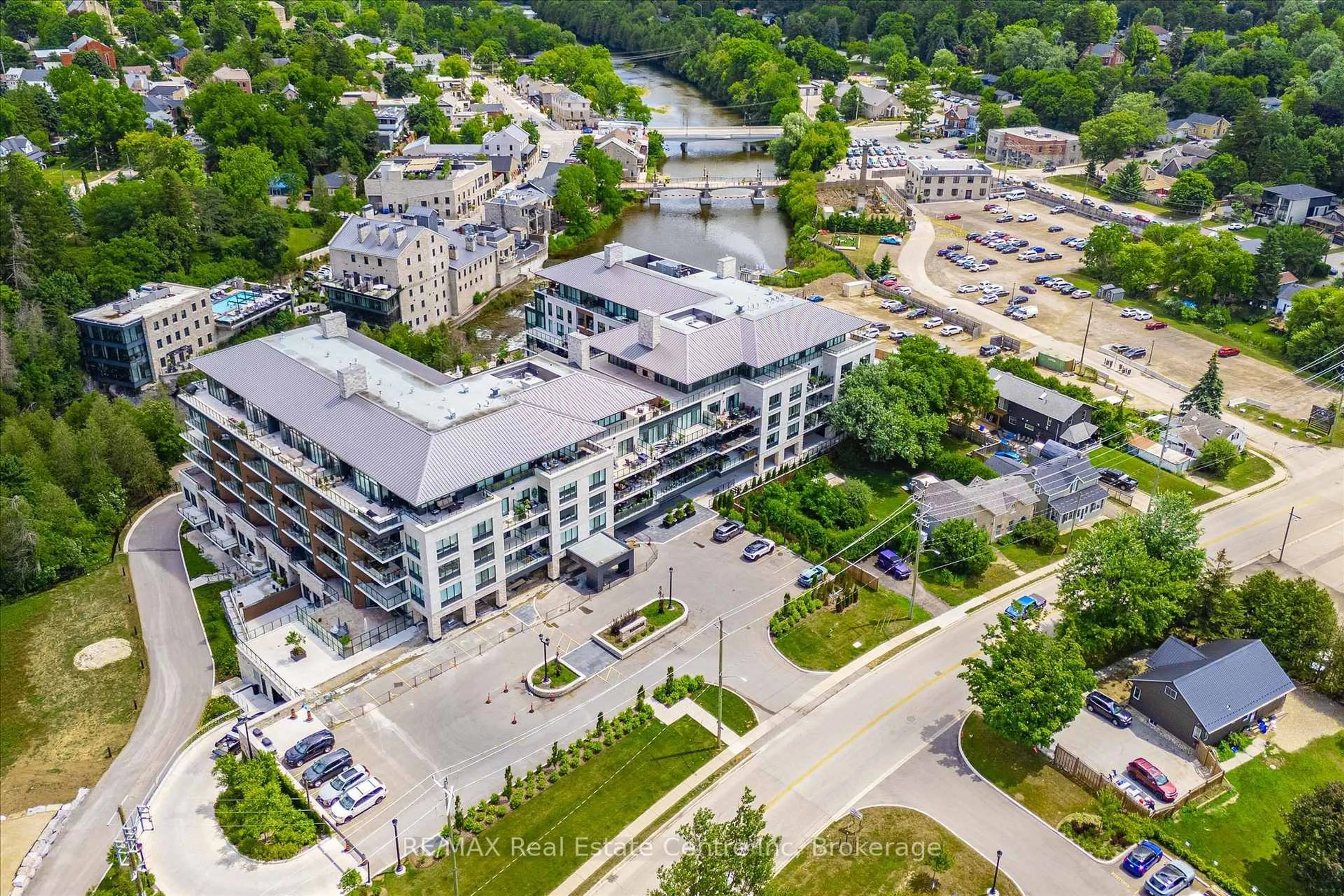 A pic from outside/outdoor area/front of a property/back of a property/a pic from drone, city buildings view from balcony for 6523 Wellington Road 7 #29, Centre Wellington Ontario N0B 1S0