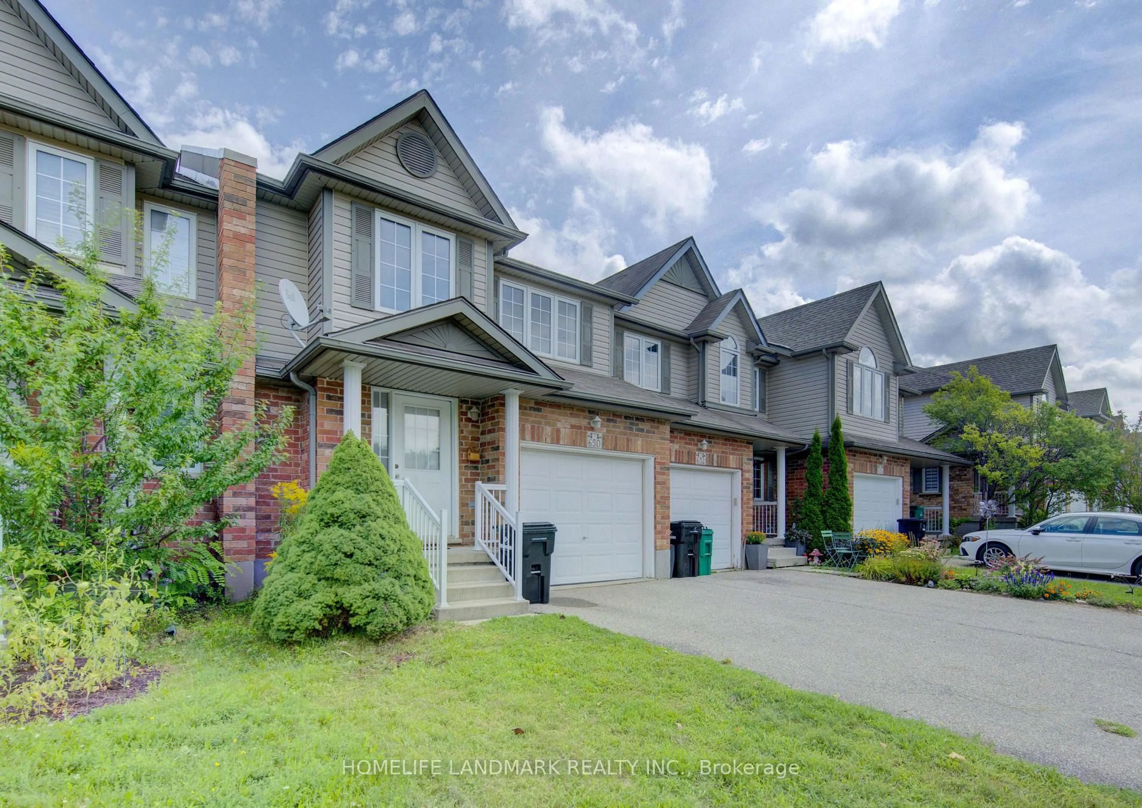 Home with brick exterior material, street for 650 Wild Ginger Ave, Waterloo Ontario N2V 2T1