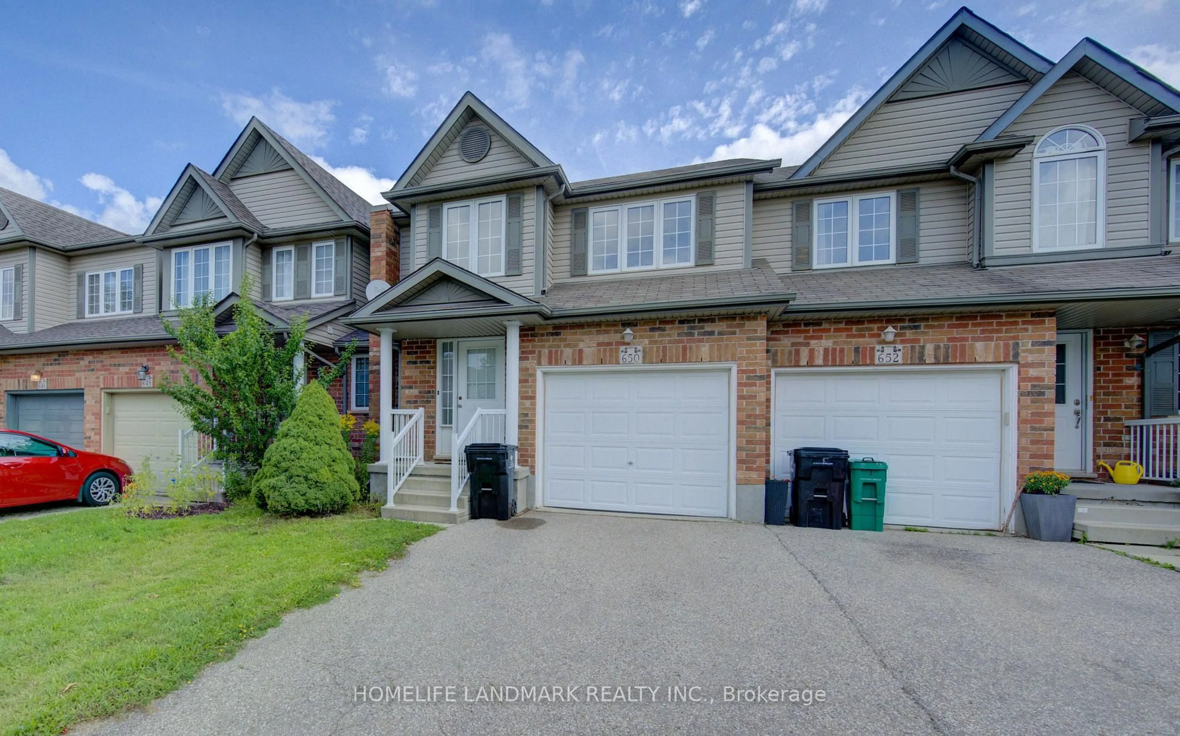 A pic from outside/outdoor area/front of a property/back of a property/a pic from drone, street for 650 Wild Ginger Ave, Waterloo Ontario N2V 2T1
