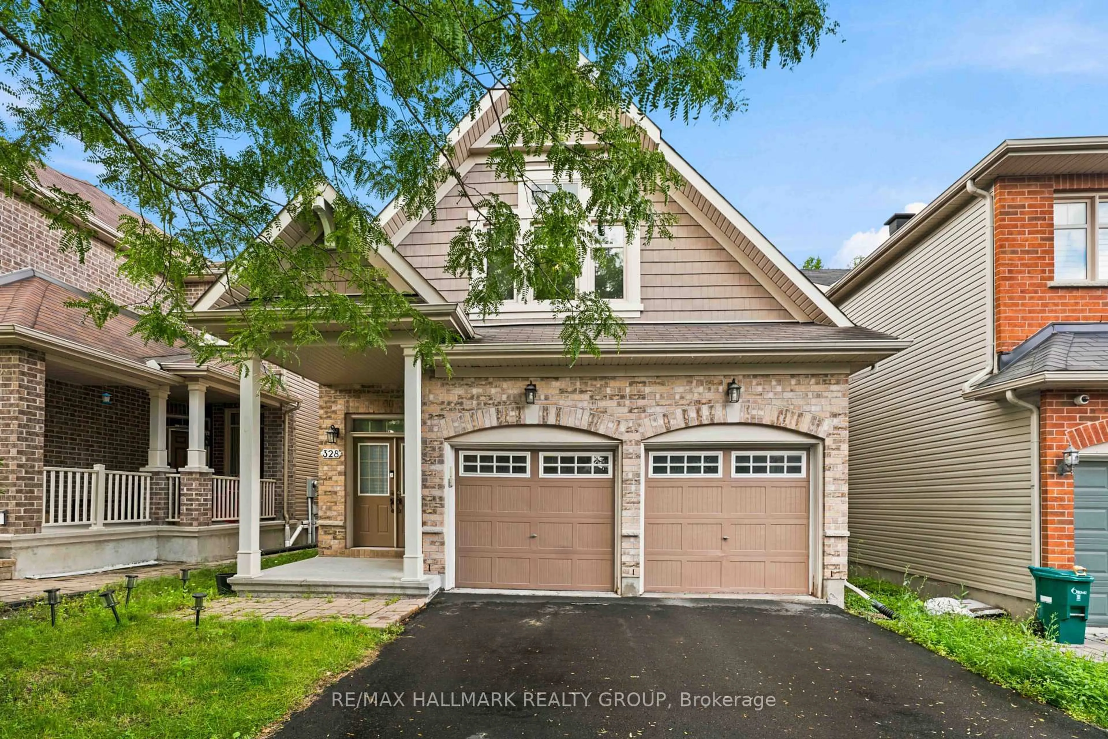 Home with brick exterior material, street for 328 Laughlin Circ, Ottawa Ontario K2T 0E1