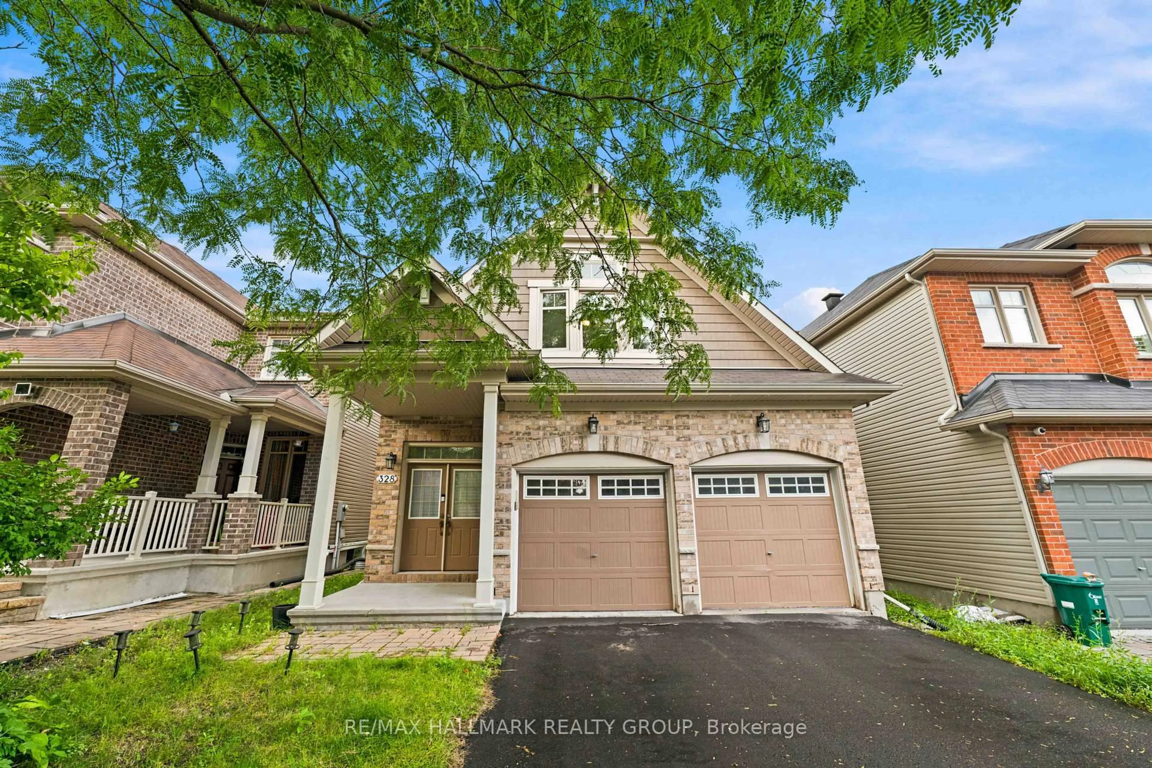 Home with brick exterior material, street for 328 Laughlin Circ, Ottawa Ontario K2T 0E1