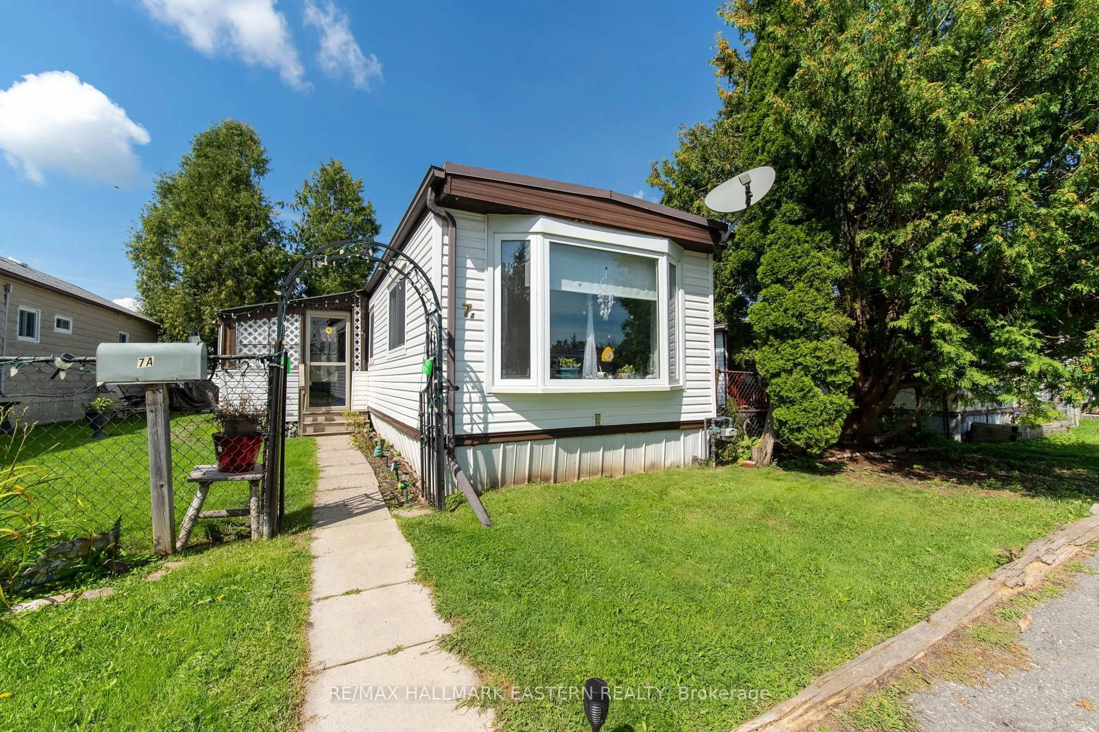 Home with vinyl exterior material, street for 2244 Heritage Line #7A, Otonabee-South Monaghan Ontario K9J 6X8
