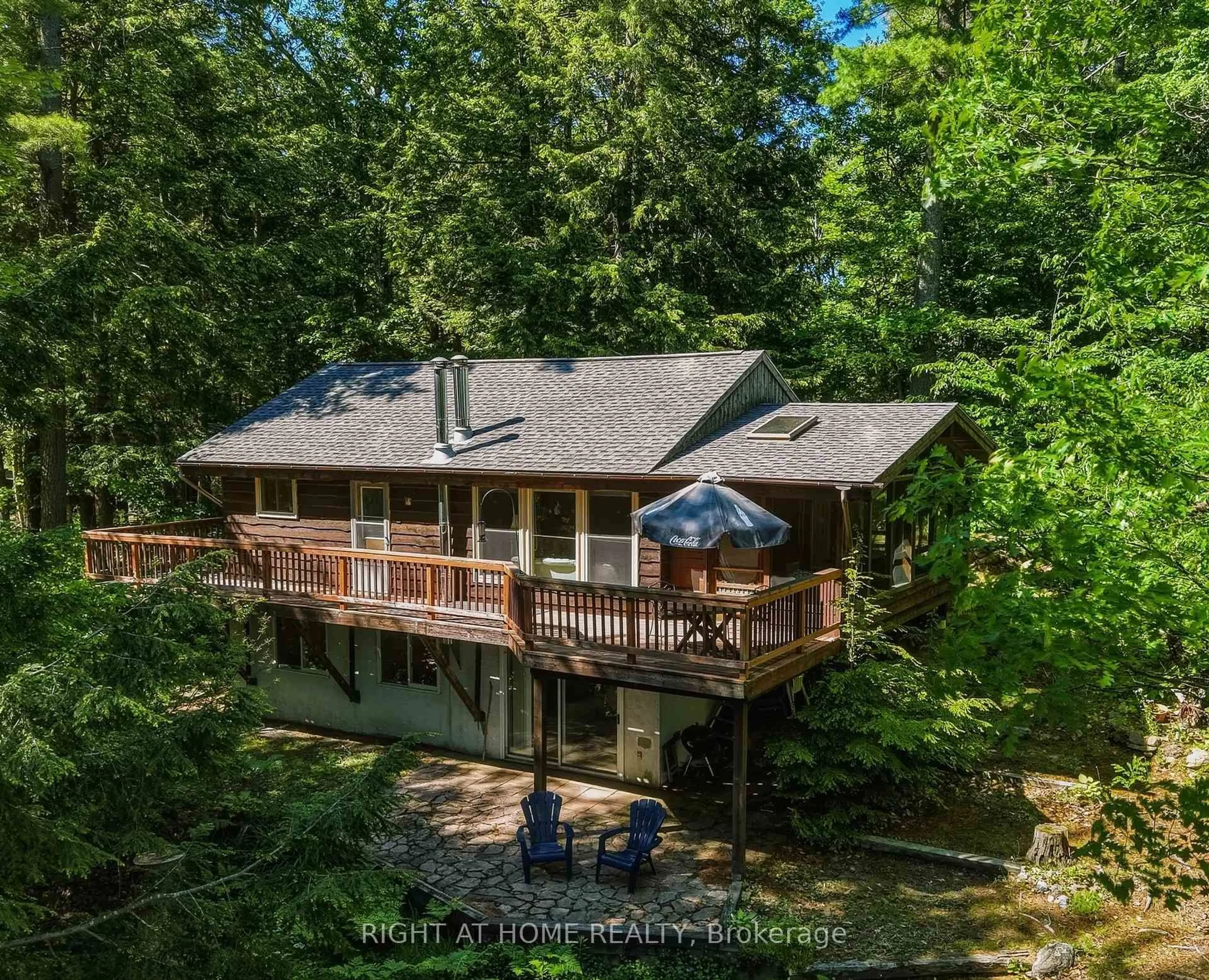 A pic from outside/outdoor area/front of a property/back of a property/a pic from drone, water/lake/river/ocean view for 1527 Moon River Rd, Muskoka Lakes Ontario P0C 1H0