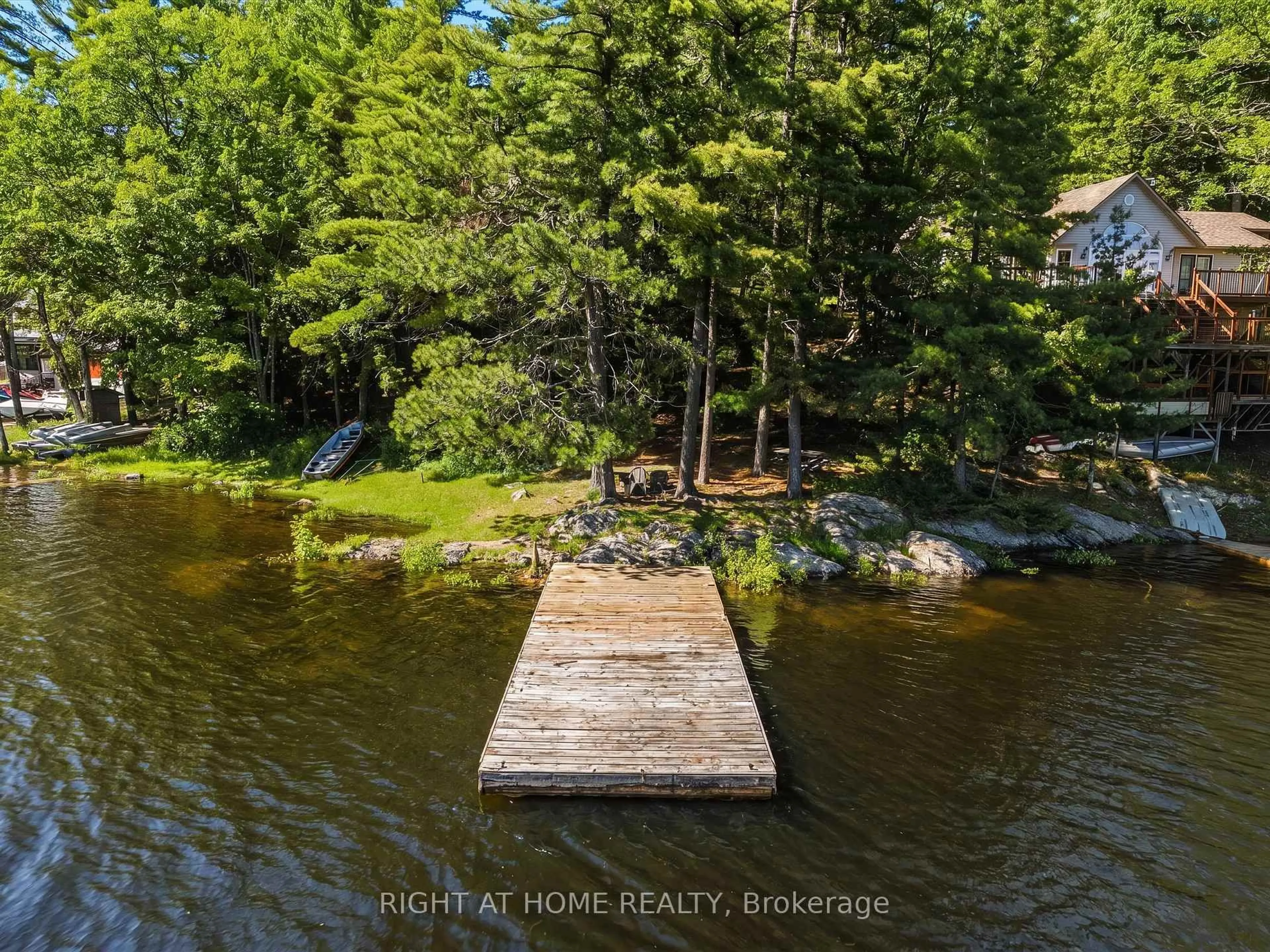 A pic from outside/outdoor area/front of a property/back of a property/a pic from drone, water/lake/river/ocean view for 1527 Moon River Rd, Muskoka Lakes Ontario P0C 1H0