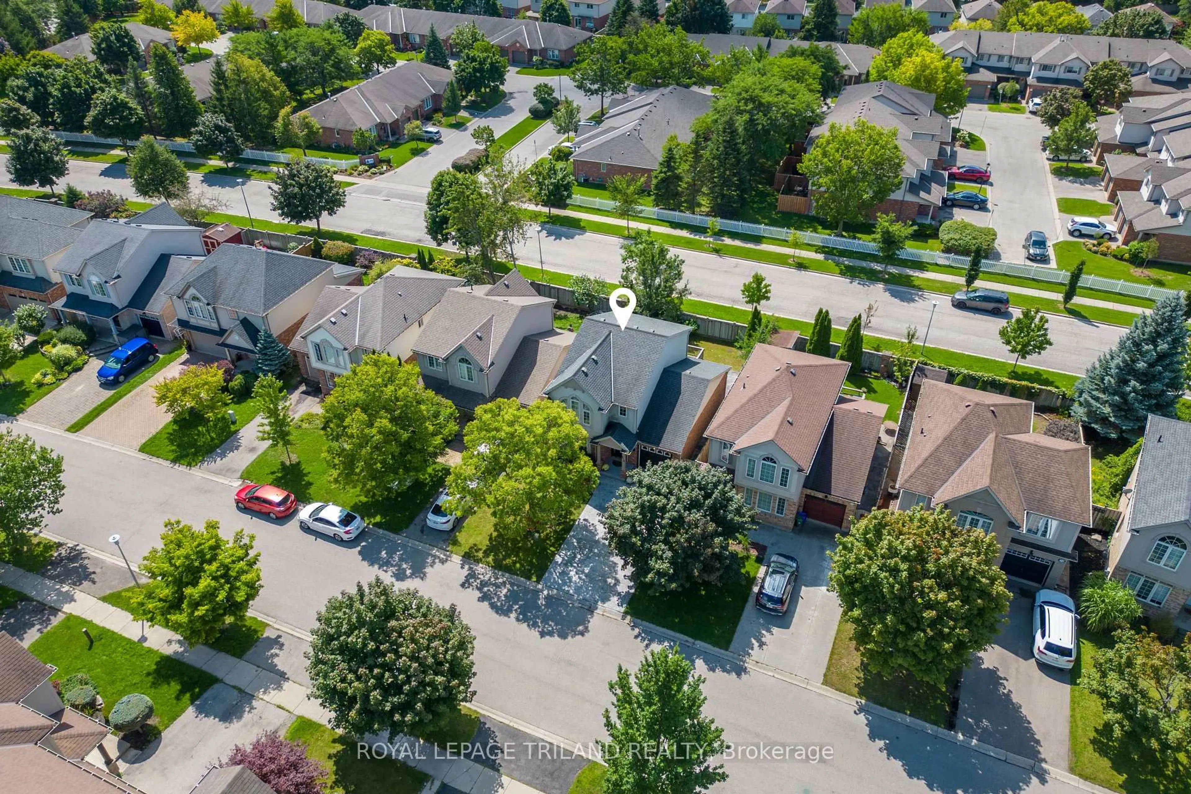 A pic from outside/outdoor area/front of a property/back of a property/a pic from drone, street for 270 South Leaksdale Circ, London South Ontario N6M 1K3