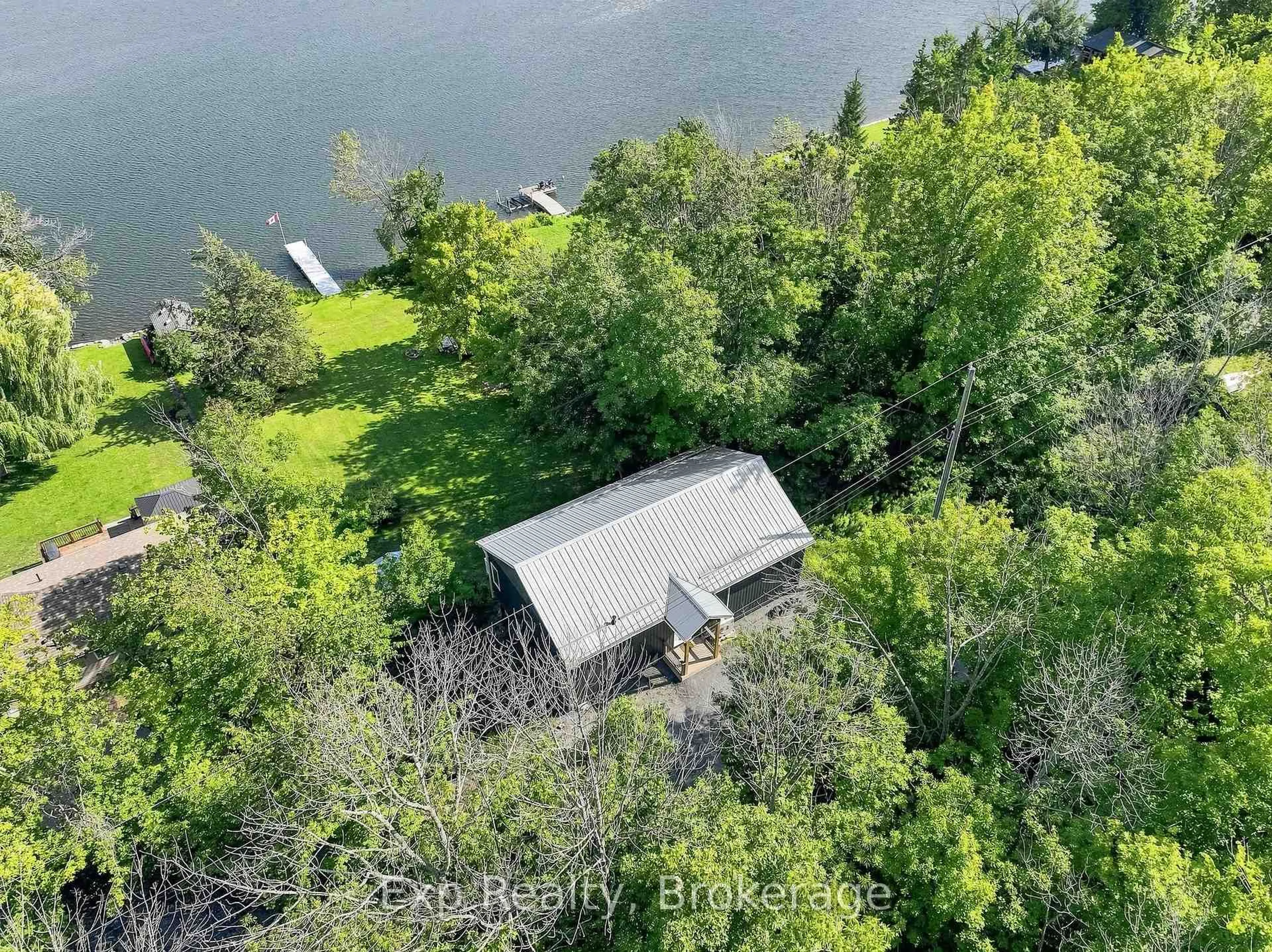 A pic from outside/outdoor area/front of a property/back of a property/a pic from drone, water/lake/river/ocean view for 1445 Trent Lane, Asphodel-Norwood Ontario K0L 2V0