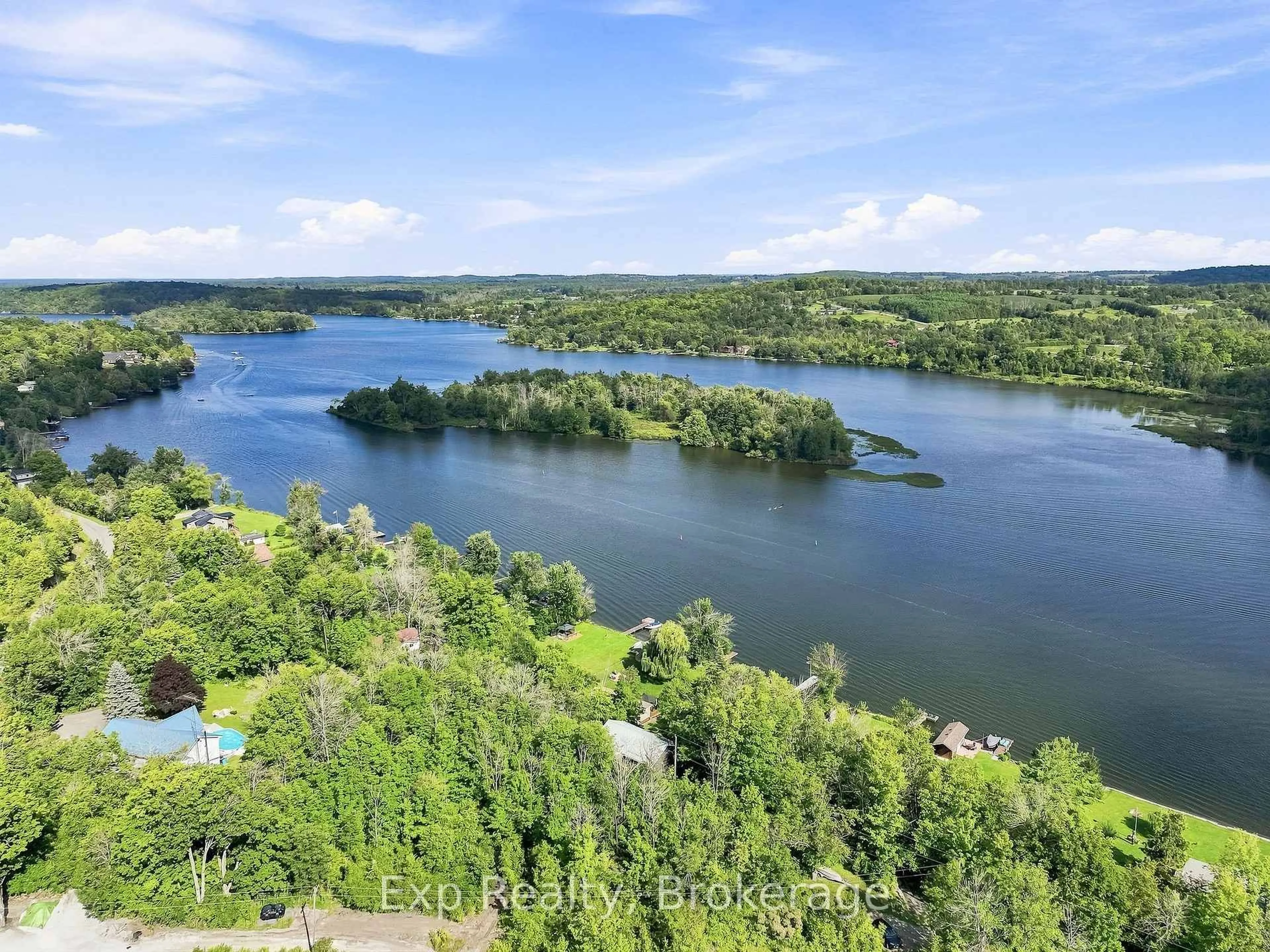 A pic from outside/outdoor area/front of a property/back of a property/a pic from drone, water/lake/river/ocean view for 1445 Trent Lane, Asphodel-Norwood Ontario K0L 2V0