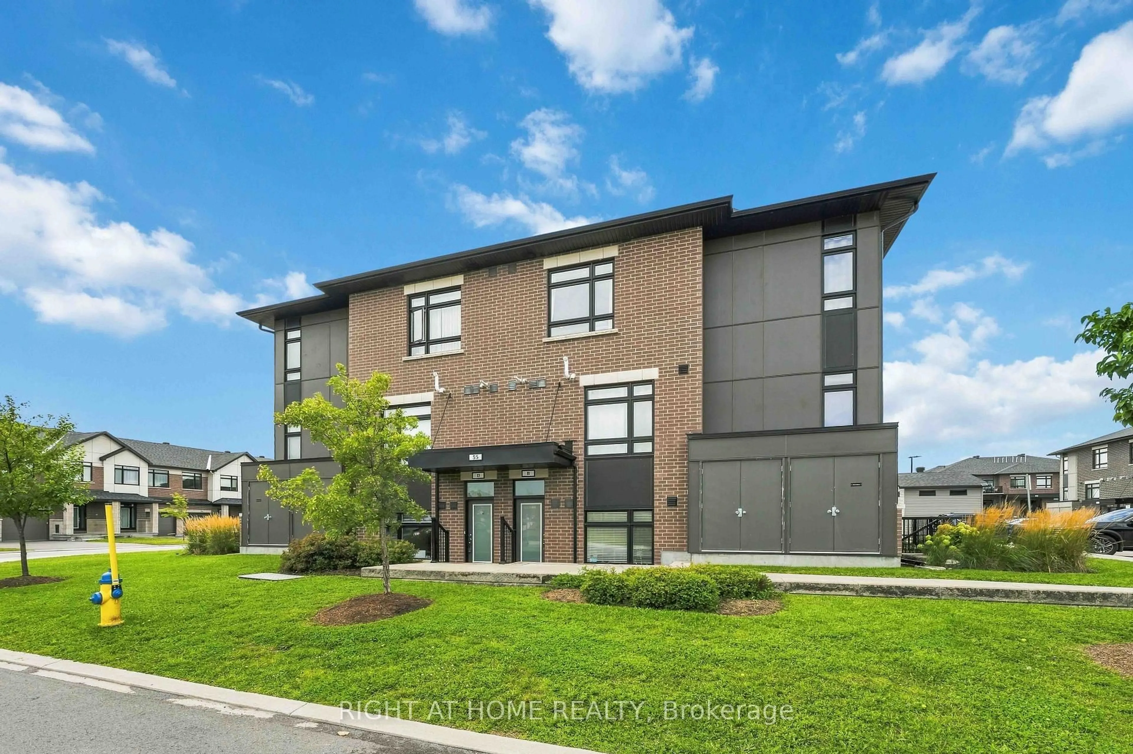 Home with brick exterior material, building for 55 Overberg Way #D, Ottawa Ontario K2S 2Y4