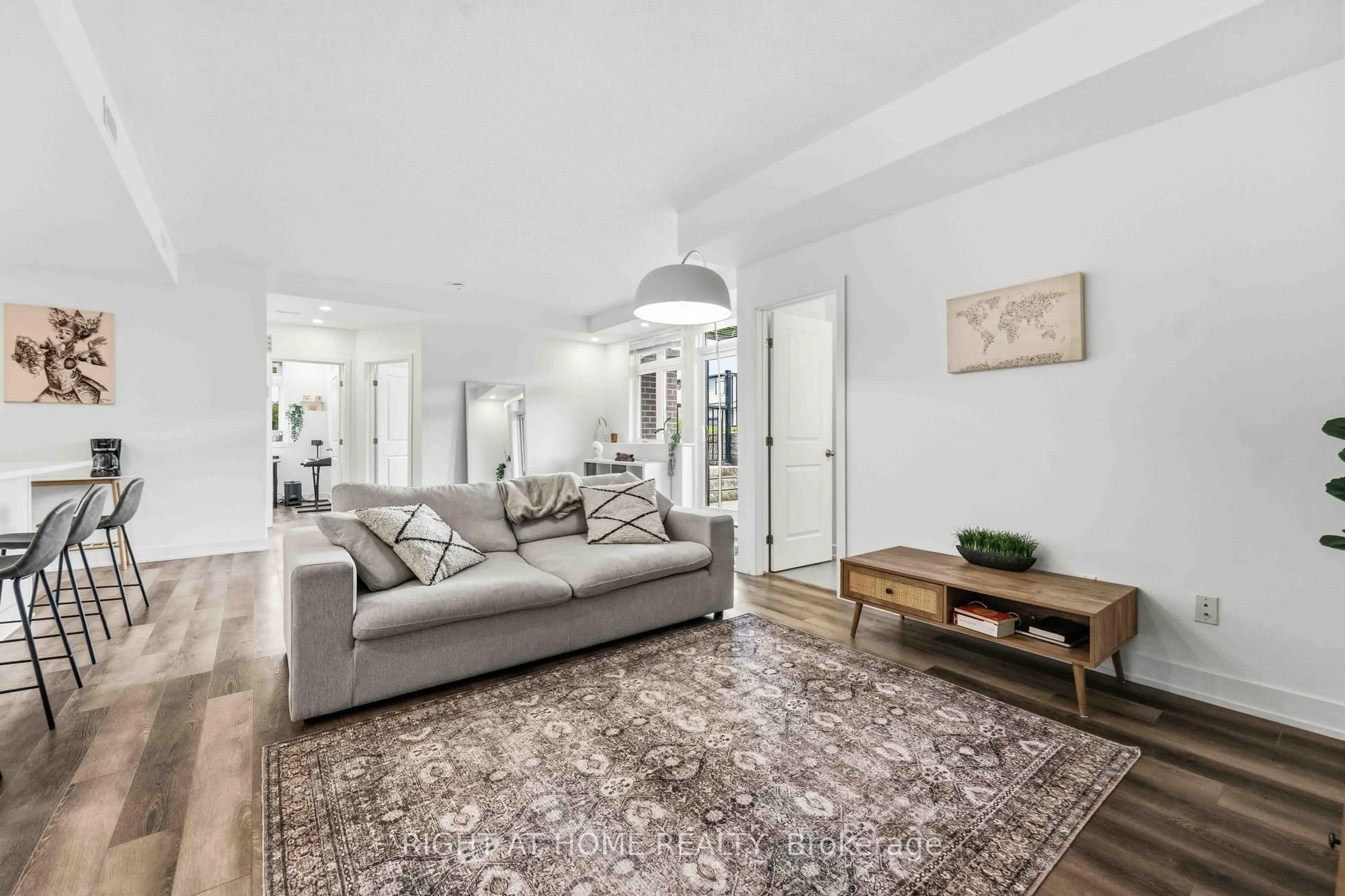 Living room with furniture, unknown for 55 Overberg Way #D, Ottawa Ontario K2S 2Y4