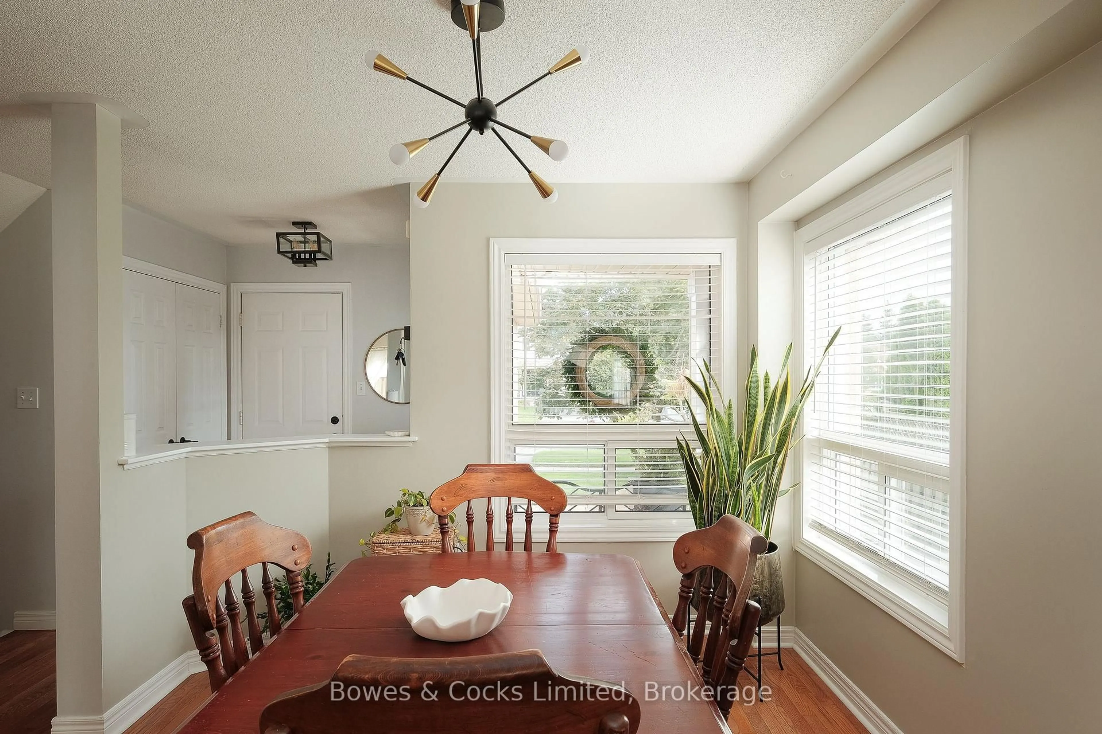 Dining room, wood/laminate floor for 407 Spillsbury Dr, Peterborough Ontario K9K 2N6
