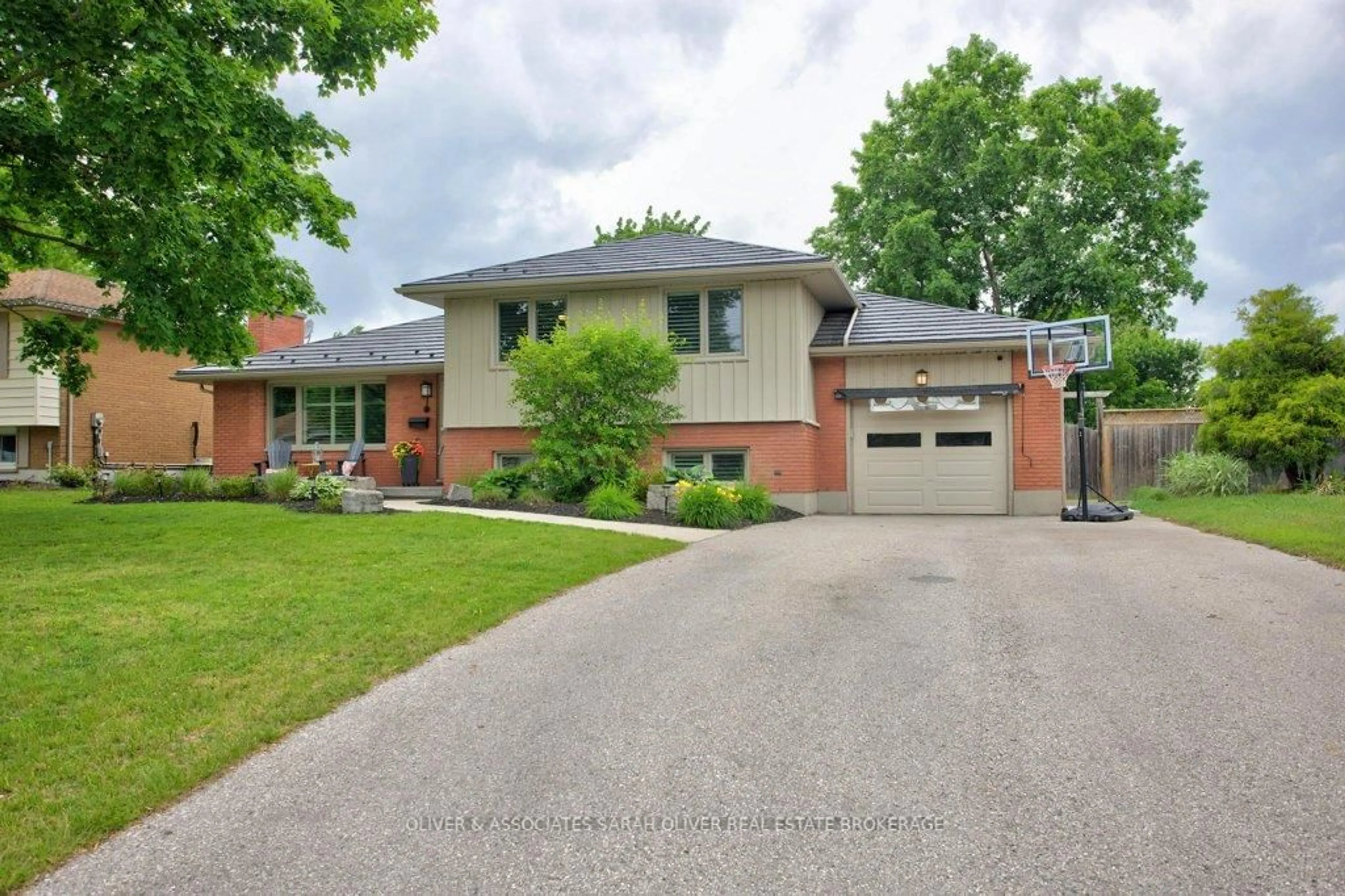 Home with brick exterior material, street for 24 Field Rd, London South Ontario N6P 1C5