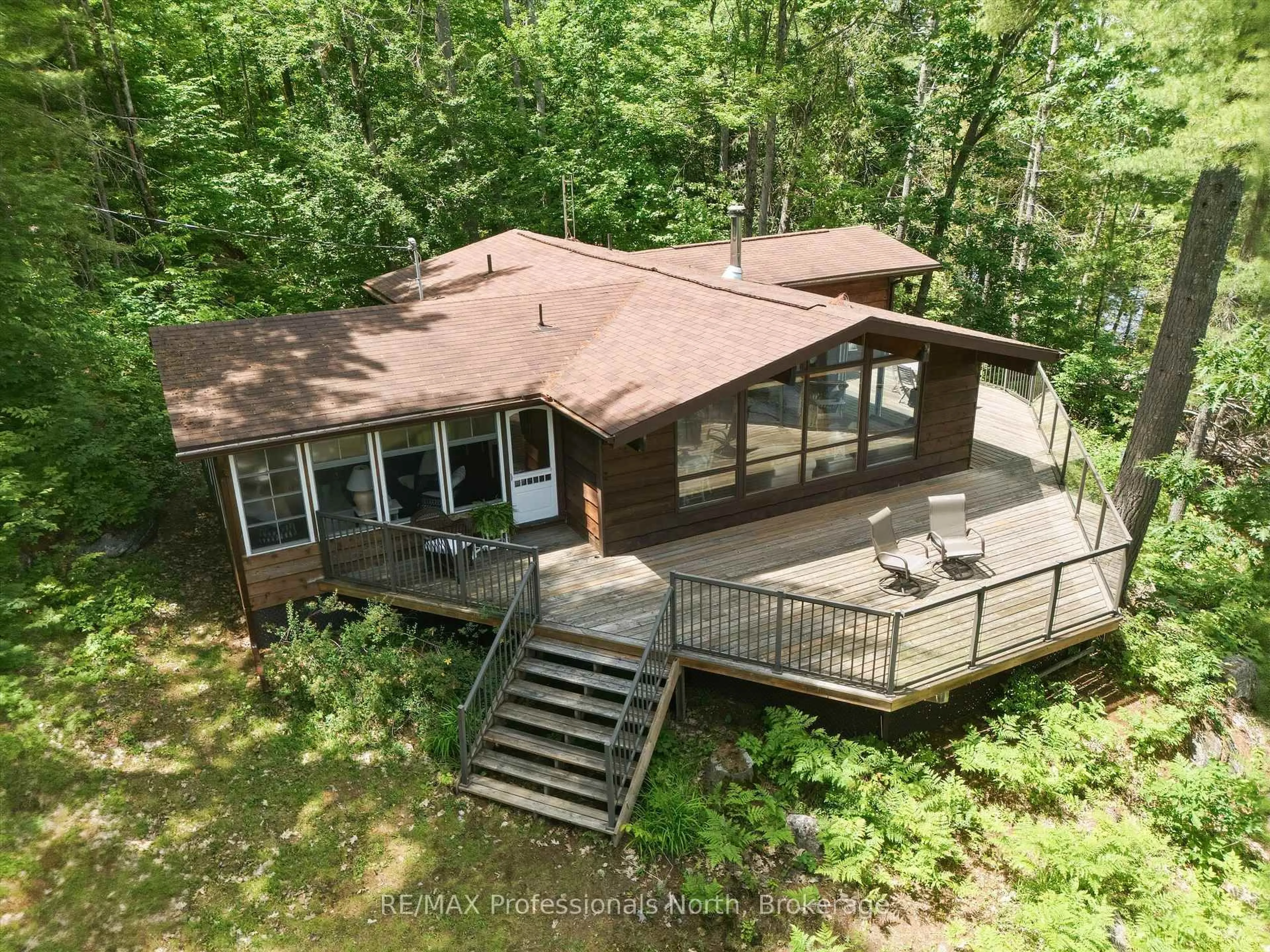 A pic from outside/outdoor area/front of a property/back of a property/a pic from drone, unknown for 23 Taylor Island, Gravenhurst Ontario P1P 1R2