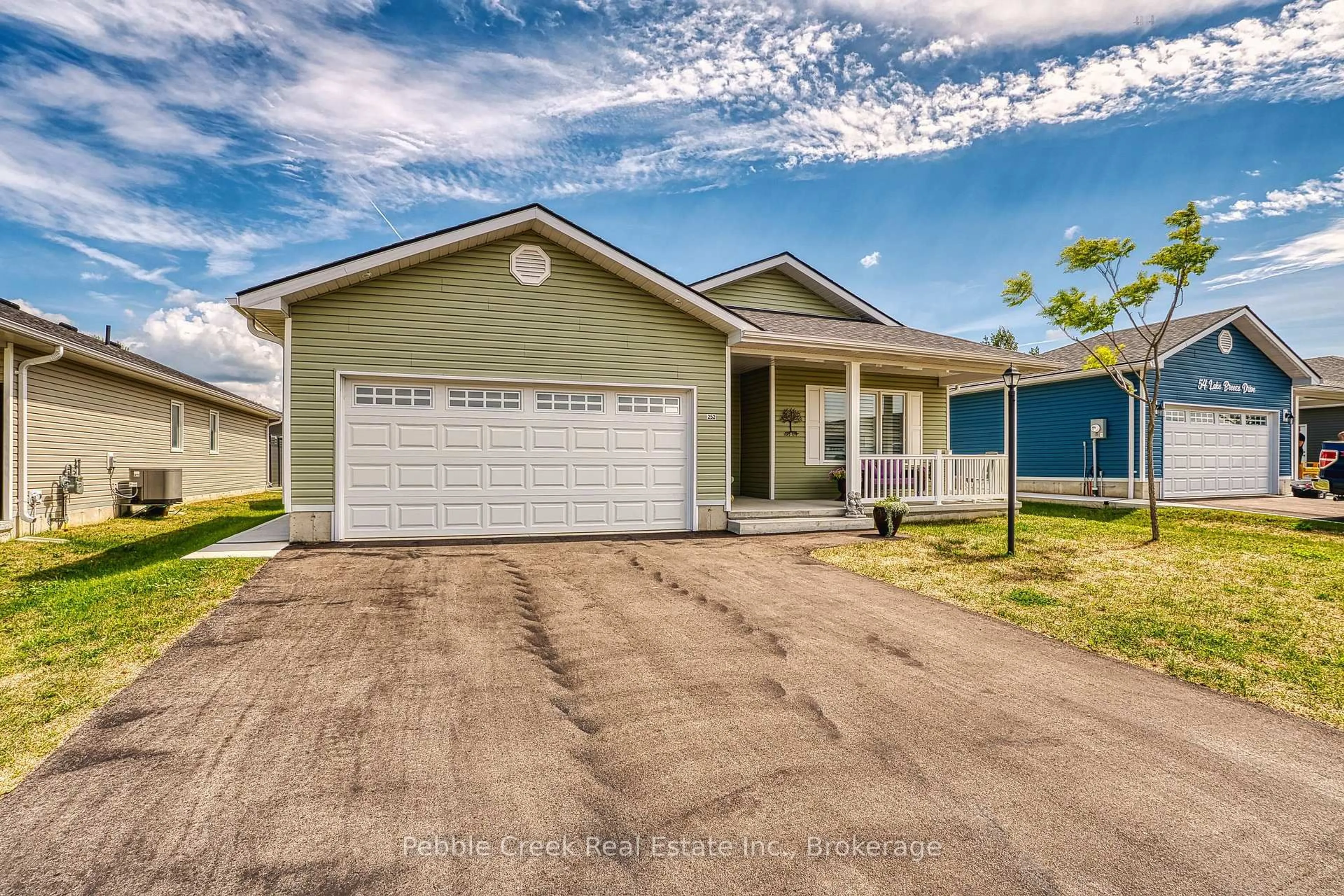 Home with vinyl exterior material, street for 252 Lake Breeze Dr, Ashfield-Colborne-Wawanosh Ontario N7A 0B9
