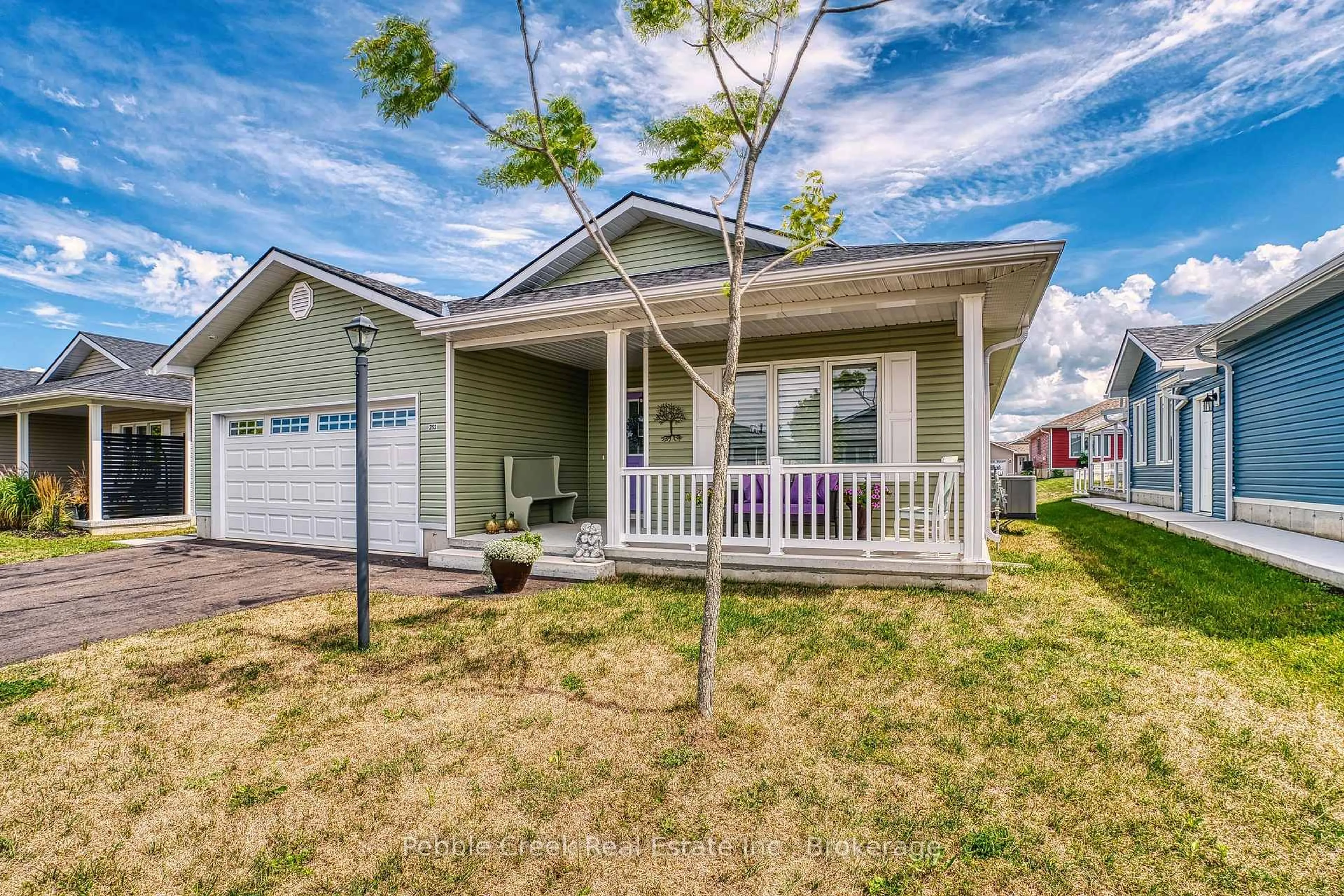 Home with vinyl exterior material, street for 252 Lake Breeze Dr, Ashfield-Colborne-Wawanosh Ontario N7A 0B9