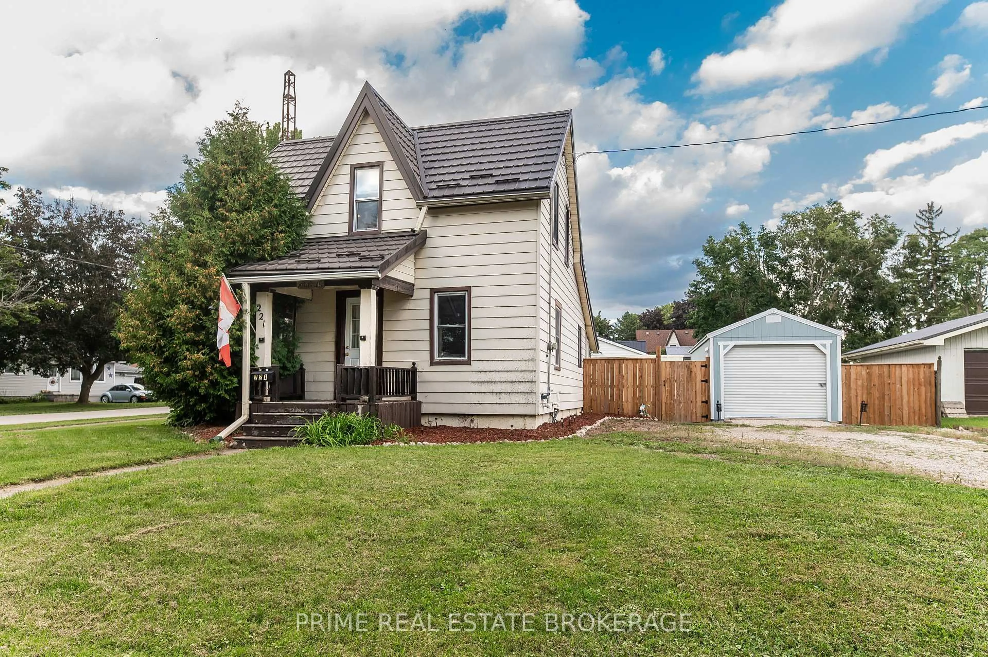 A pic from outside/outdoor area/front of a property/back of a property/a pic from drone, street for 221 Third St, West Elgin Ontario N0L 2C0