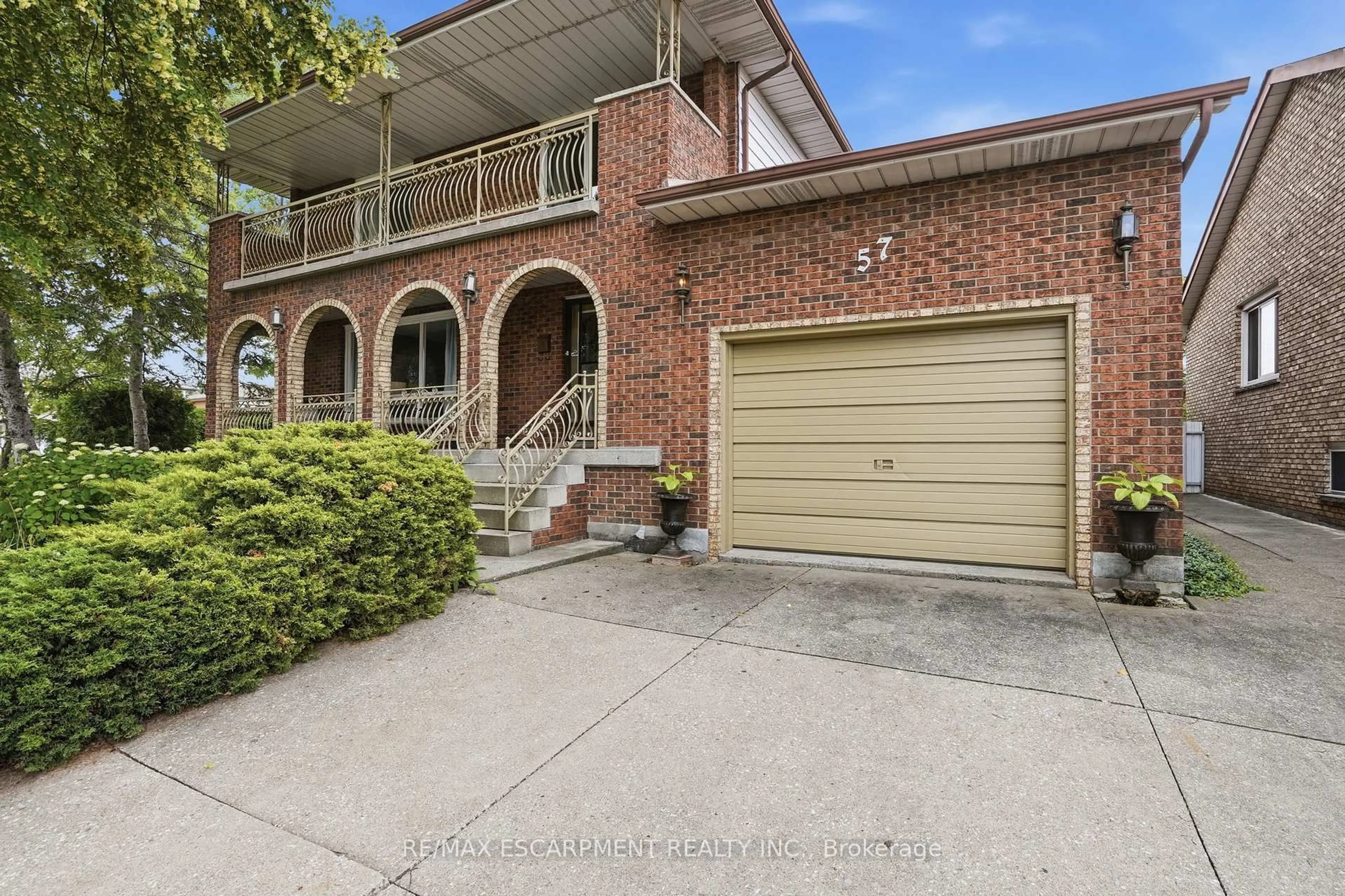 Home with brick exterior material, street for 57 NEIL Ave, Hamilton Ontario L8G 2N1
