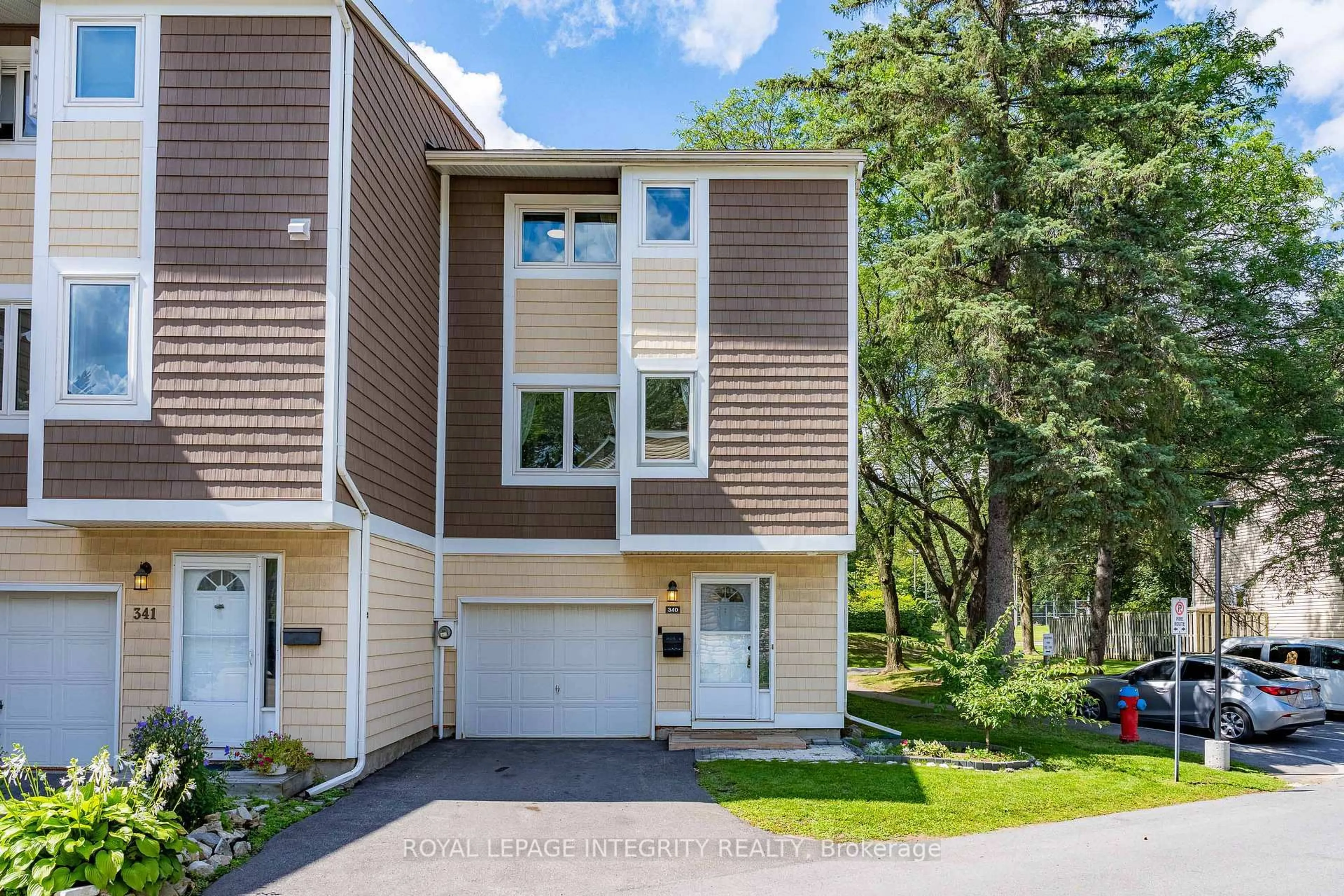 Home with vinyl exterior material, street for 340 Stowe Crt #171, Ottawa Ontario K2K 1Z6