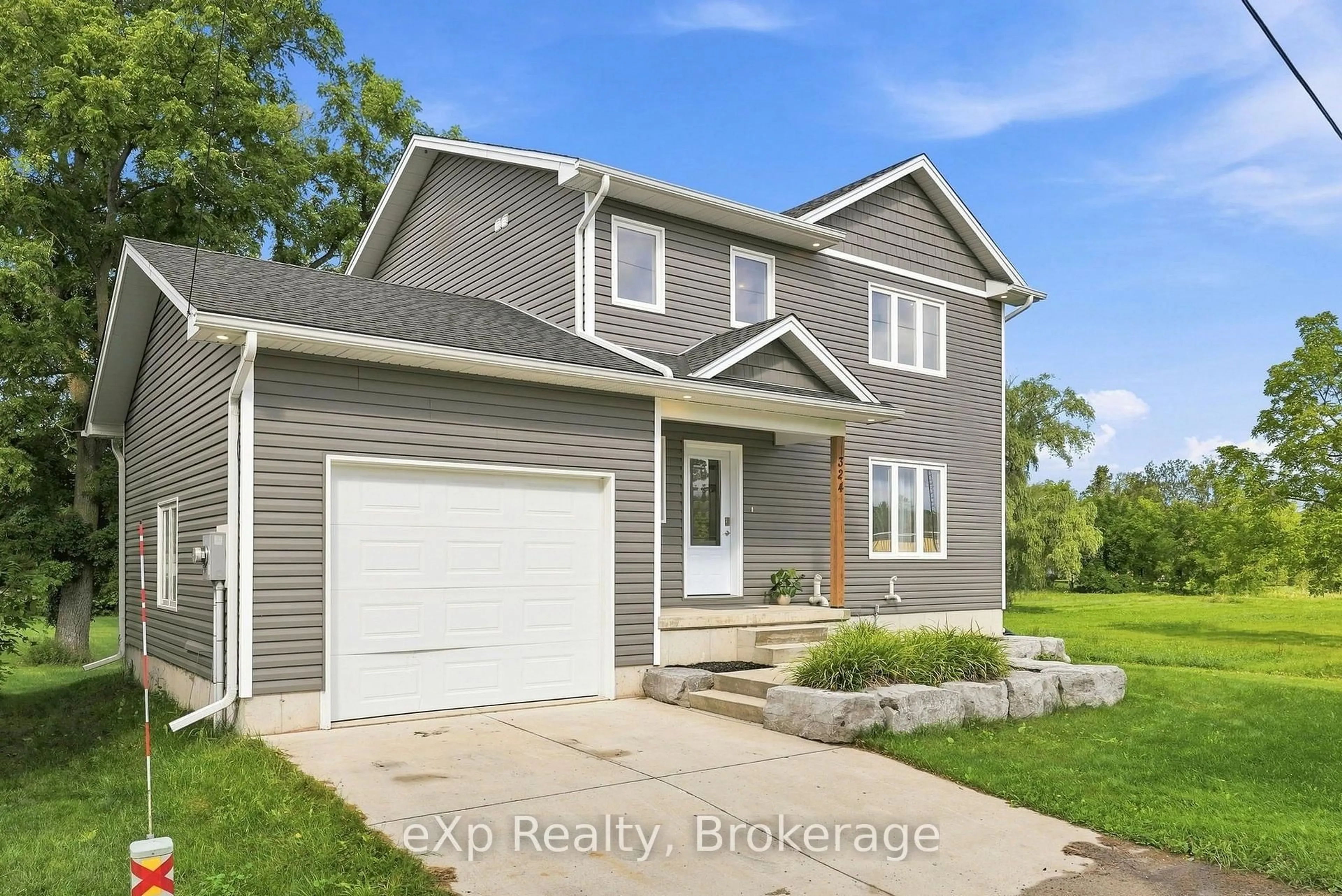 Home with vinyl exterior material, street for 324 David Winkler Pkwy, West Grey Ontario N0G 2M0