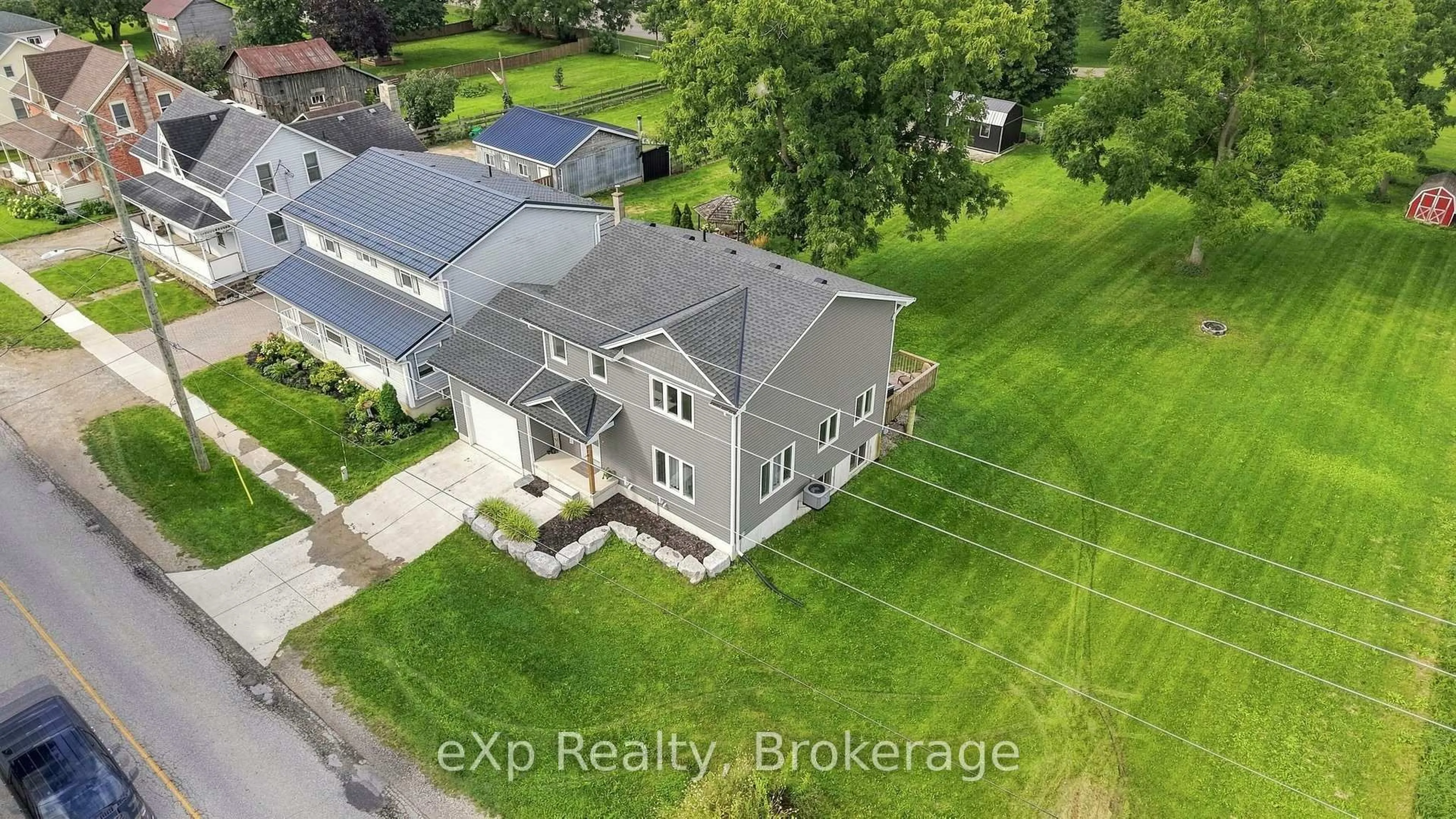 A pic from outside/outdoor area/front of a property/back of a property/a pic from drone, street for 324 David Winkler Pkwy, West Grey Ontario N0G 2M0