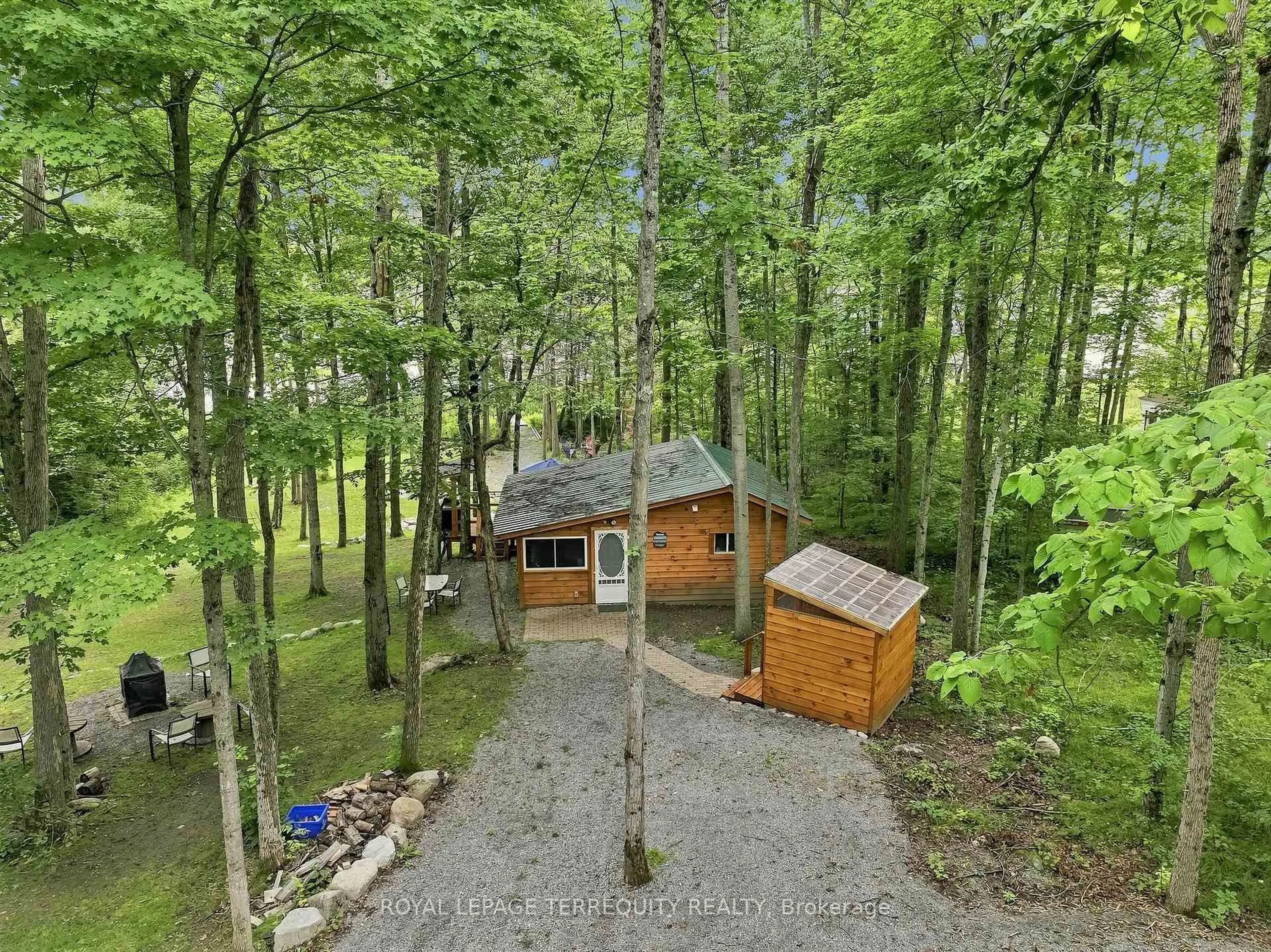 A pic from outside/outdoor area/front of a property/back of a property/a pic from drone, forest/trees view for 299 Swinburne Lane, Limoges Ontario K0K 2M0