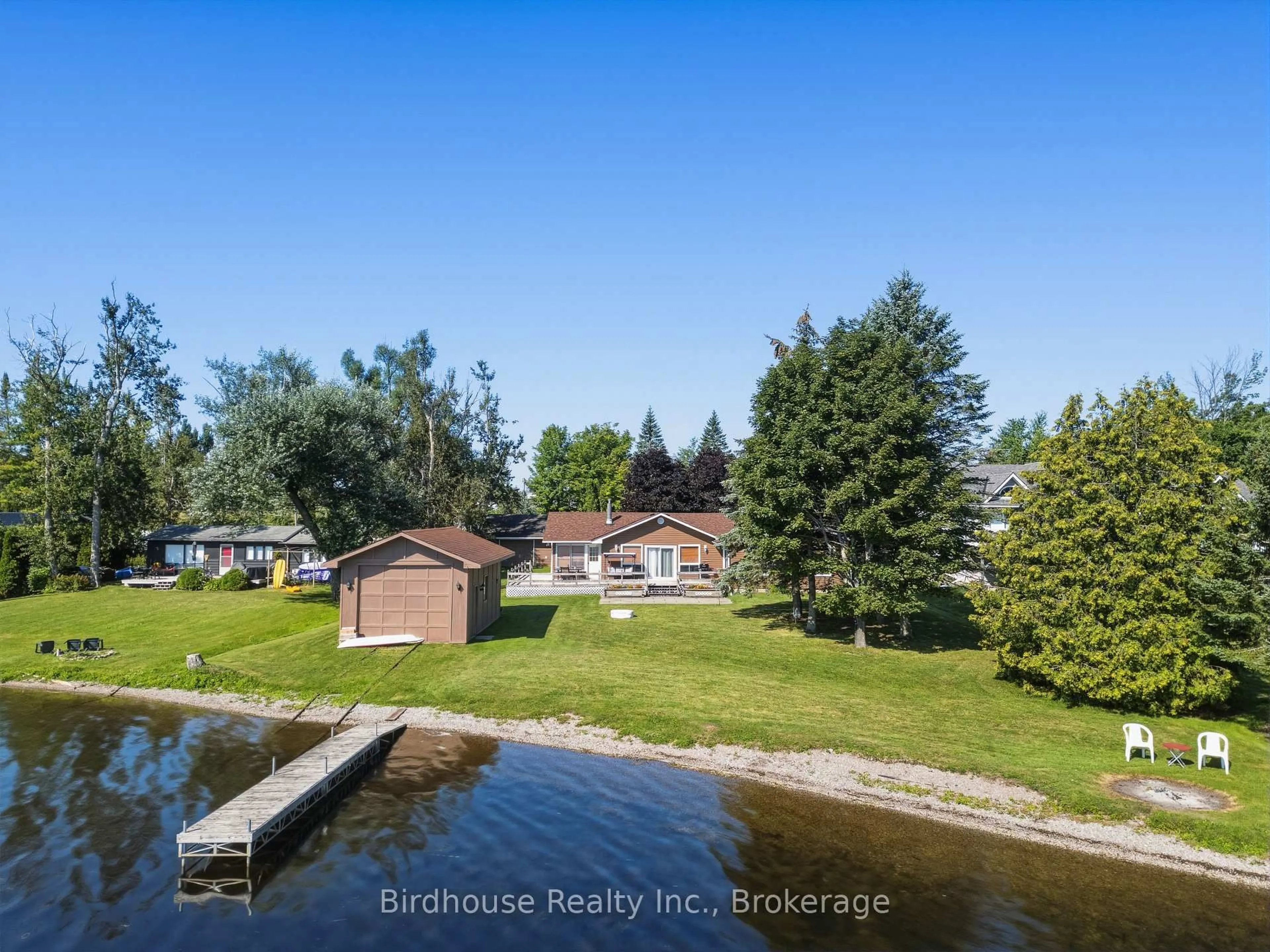 A pic from outside/outdoor area/front of a property/back of a property/a pic from drone, water/lake/river/ocean view for 24 Gillis St, Kawartha Lakes Ontario K0M 1G0