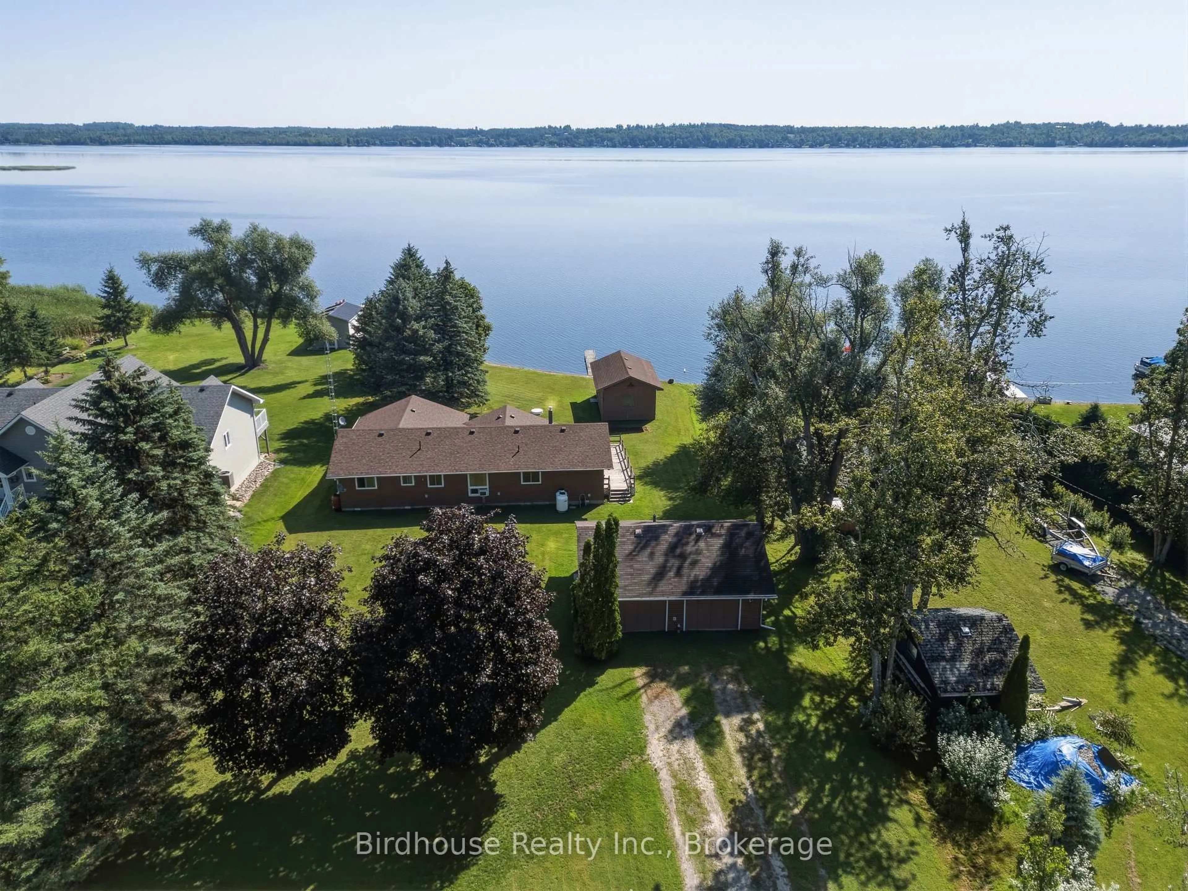 A pic from outside/outdoor area/front of a property/back of a property/a pic from drone, water/lake/river/ocean view for 24 Gillis St, Kawartha Lakes Ontario K0M 1G0