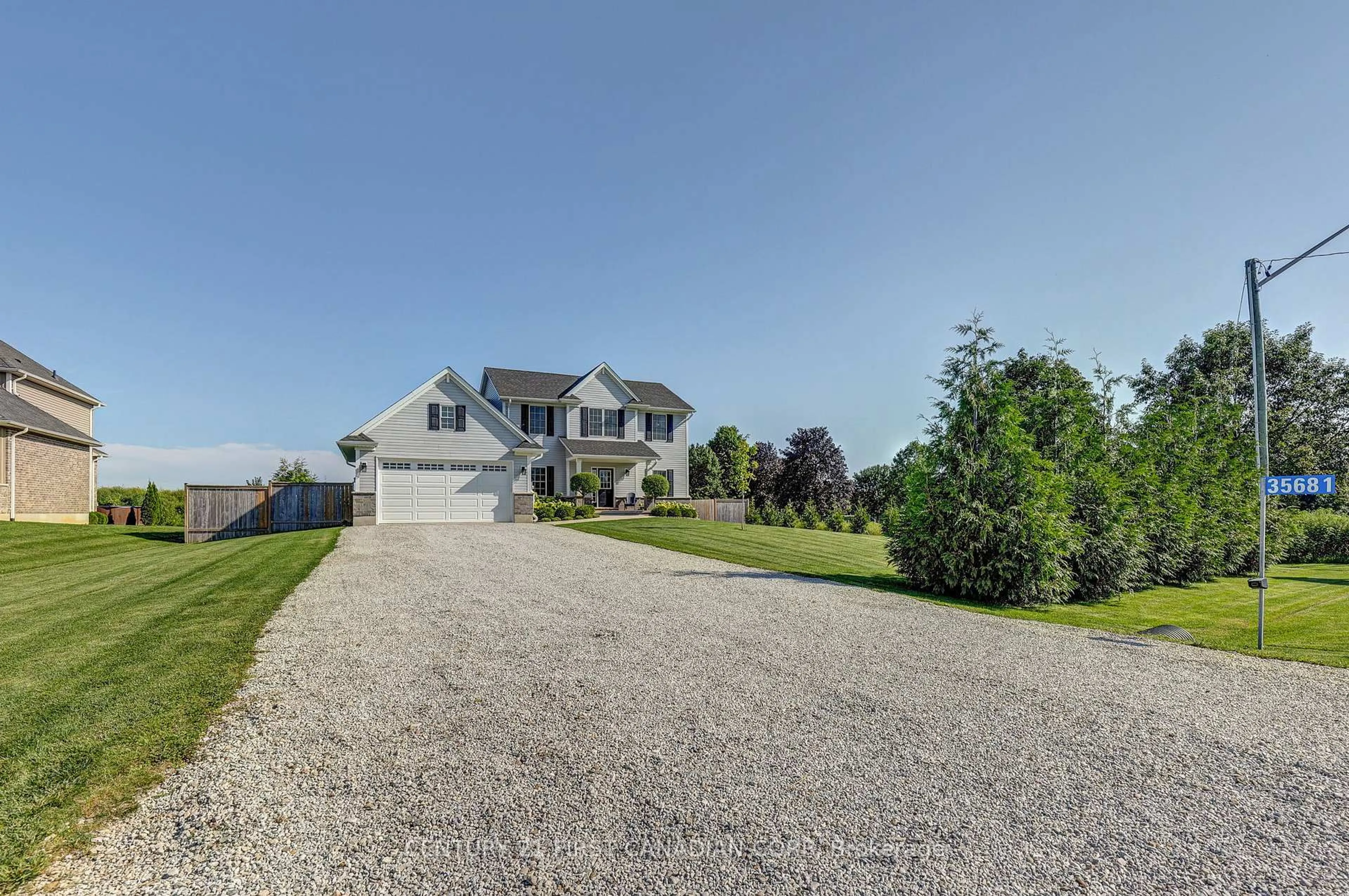 A pic from outside/outdoor area/front of a property/back of a property/a pic from drone, street for 35681 Talbot Line, Southwold Ontario N0L 2E0