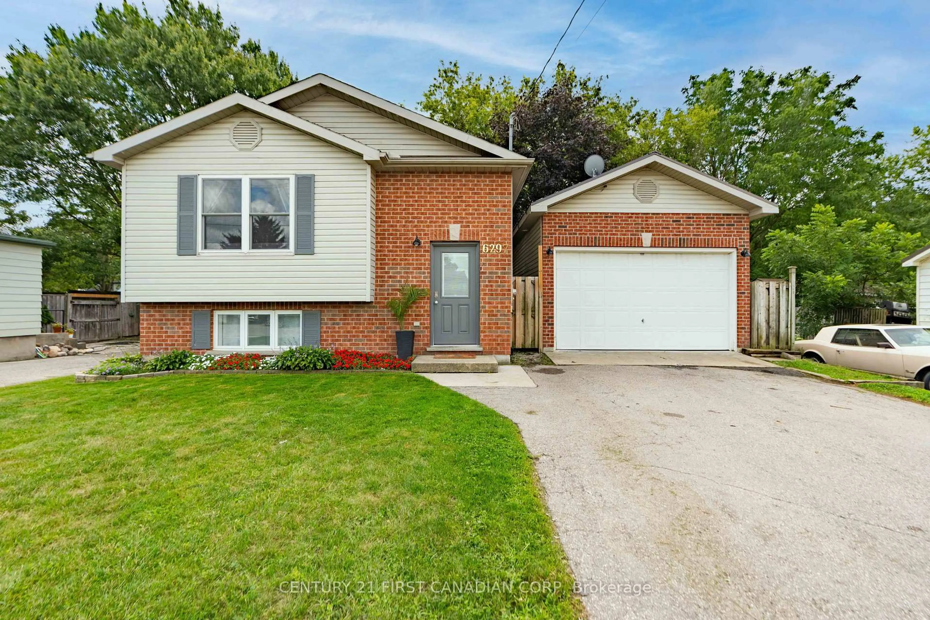 Home with brick exterior material, street for 6297 William St, Lucan Biddulph Ontario N0B 2P0