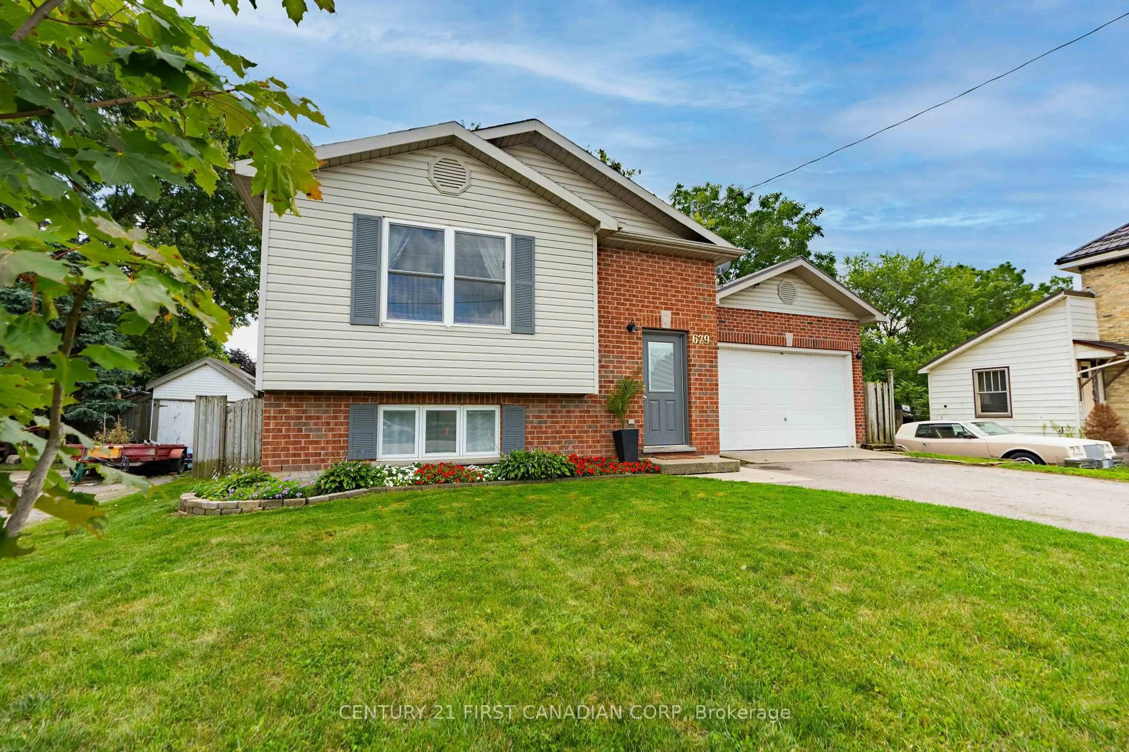 Home with brick exterior material, street for 6297 William St, Lucan Biddulph Ontario N0B 2P0