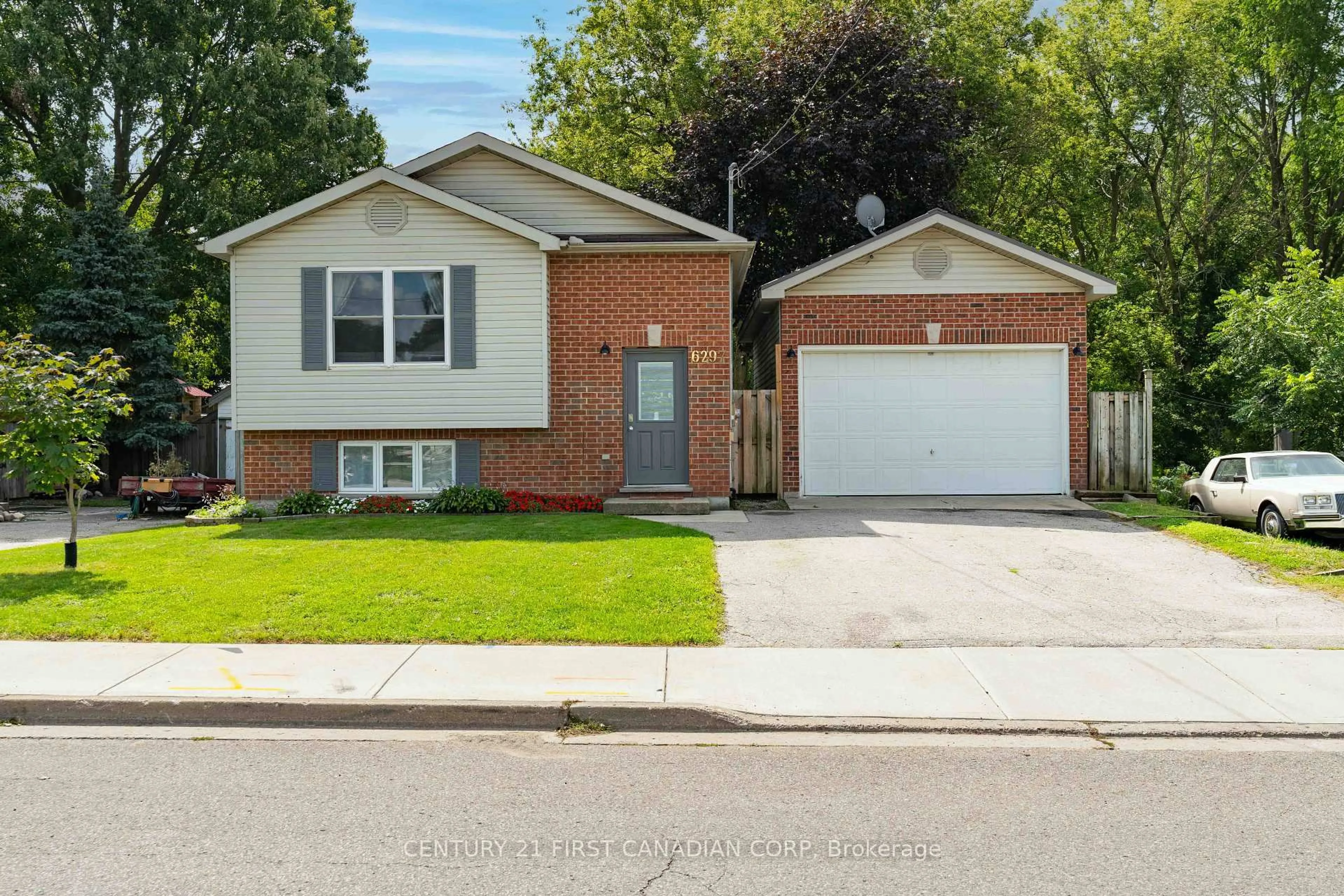 Home with brick exterior material, street for 6297 William St, Lucan Biddulph Ontario N0B 2P0