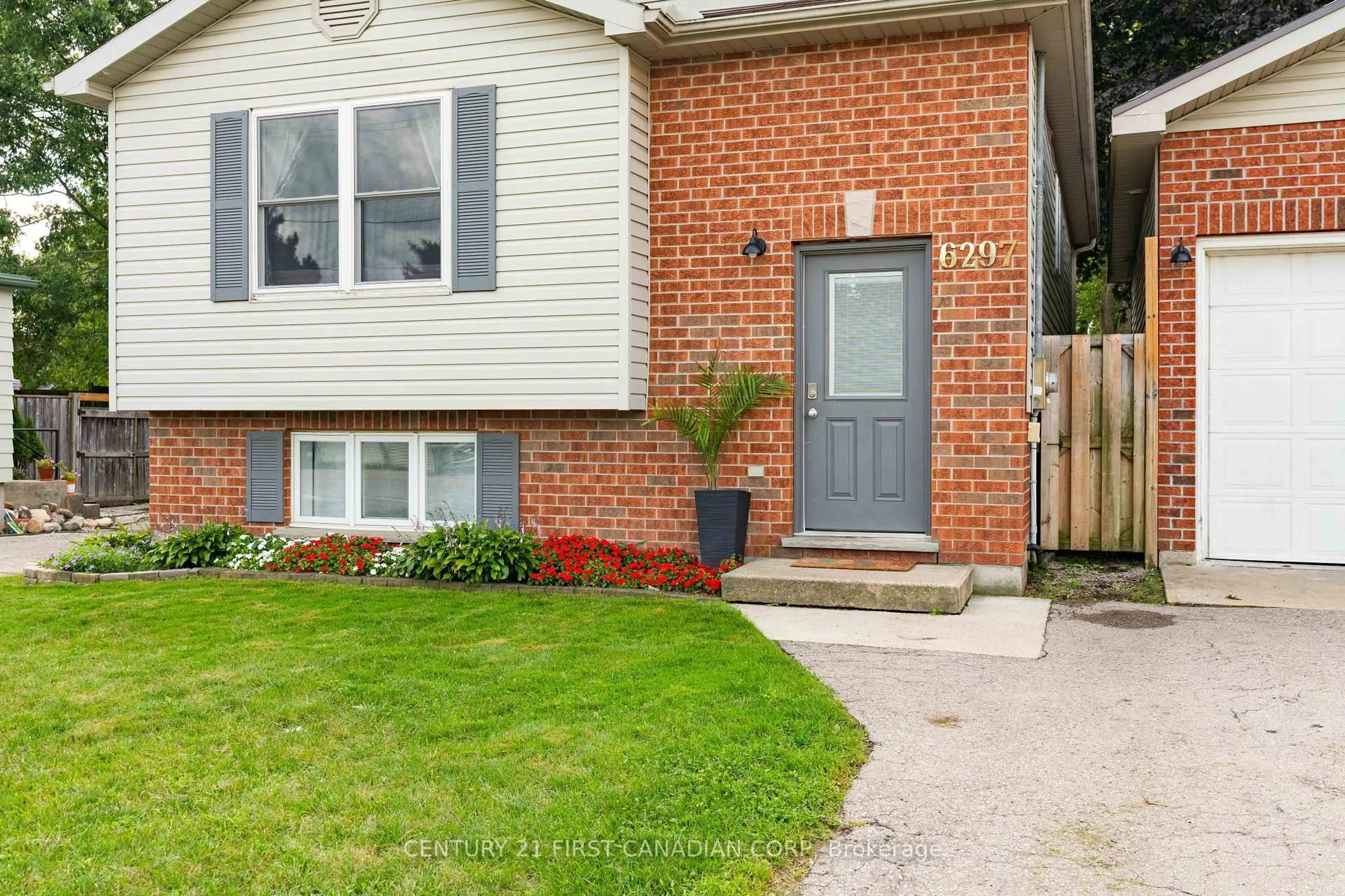 Home with brick exterior material, street for 6297 William St, Lucan Biddulph Ontario N0B 2P0