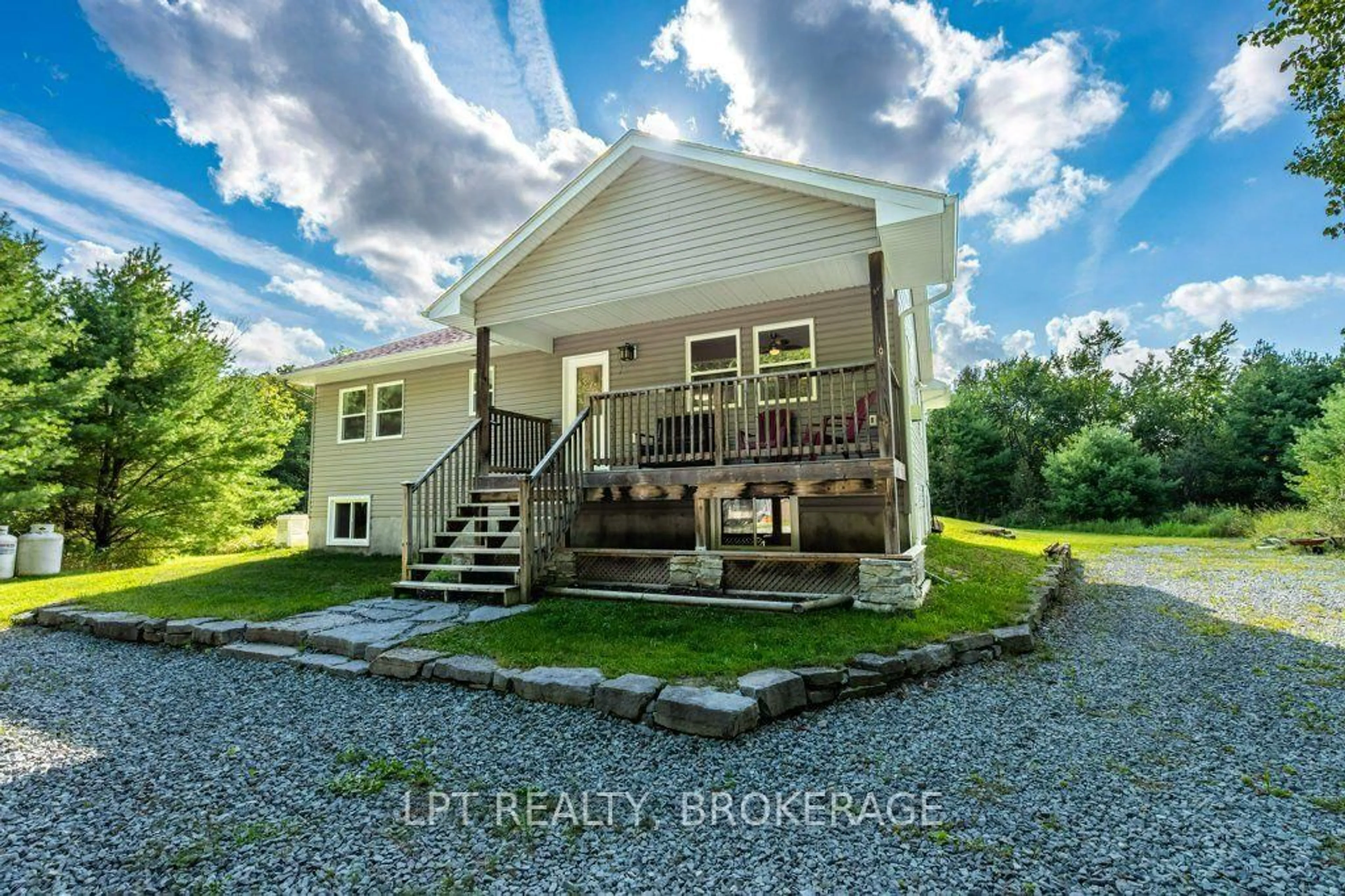 A pic from outside/outdoor area/front of a property/back of a property/a pic from drone, building for 131 Leisure Point Rd, Rideau Lakes Ontario K0G 1X0