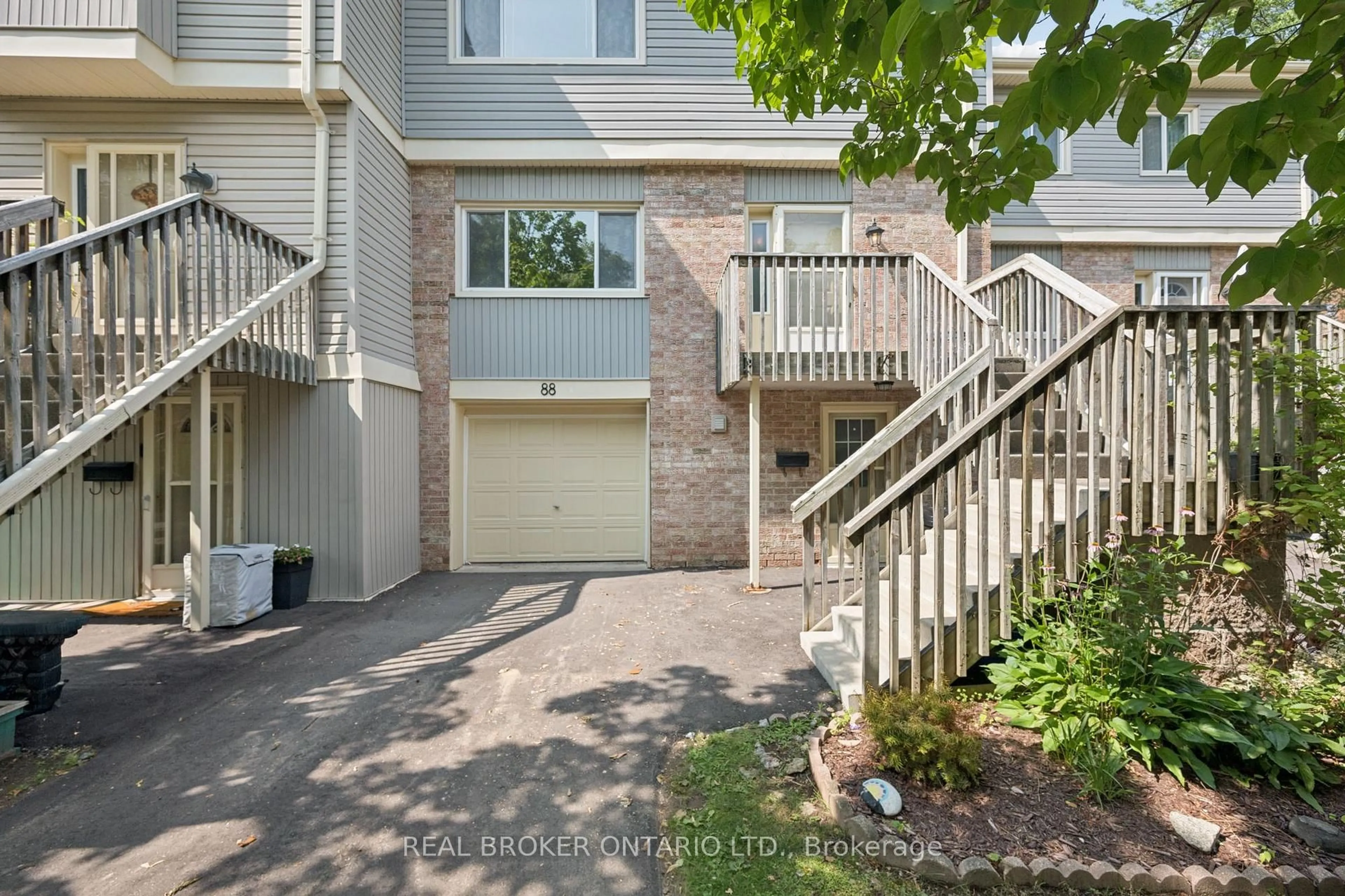 A pic from outside/outdoor area/front of a property/back of a property/a pic from drone, street for 30 Green Valley Dr #88, Kitchener Ontario N2P 1G8