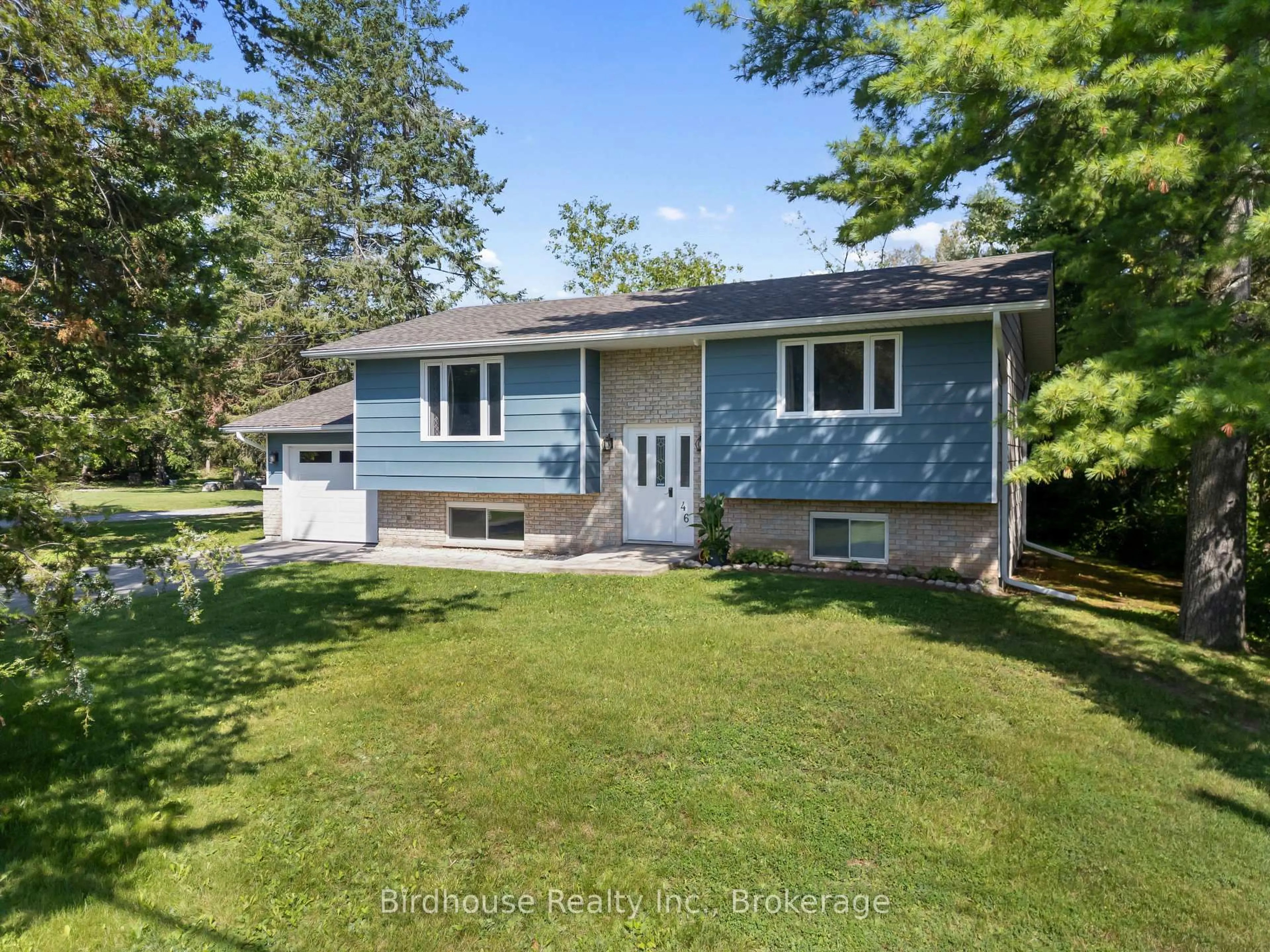 A pic from outside/outdoor area/front of a property/back of a property/a pic from drone, street for 46 Riverside Dr, Kawartha Lakes Ontario K0M 1A0