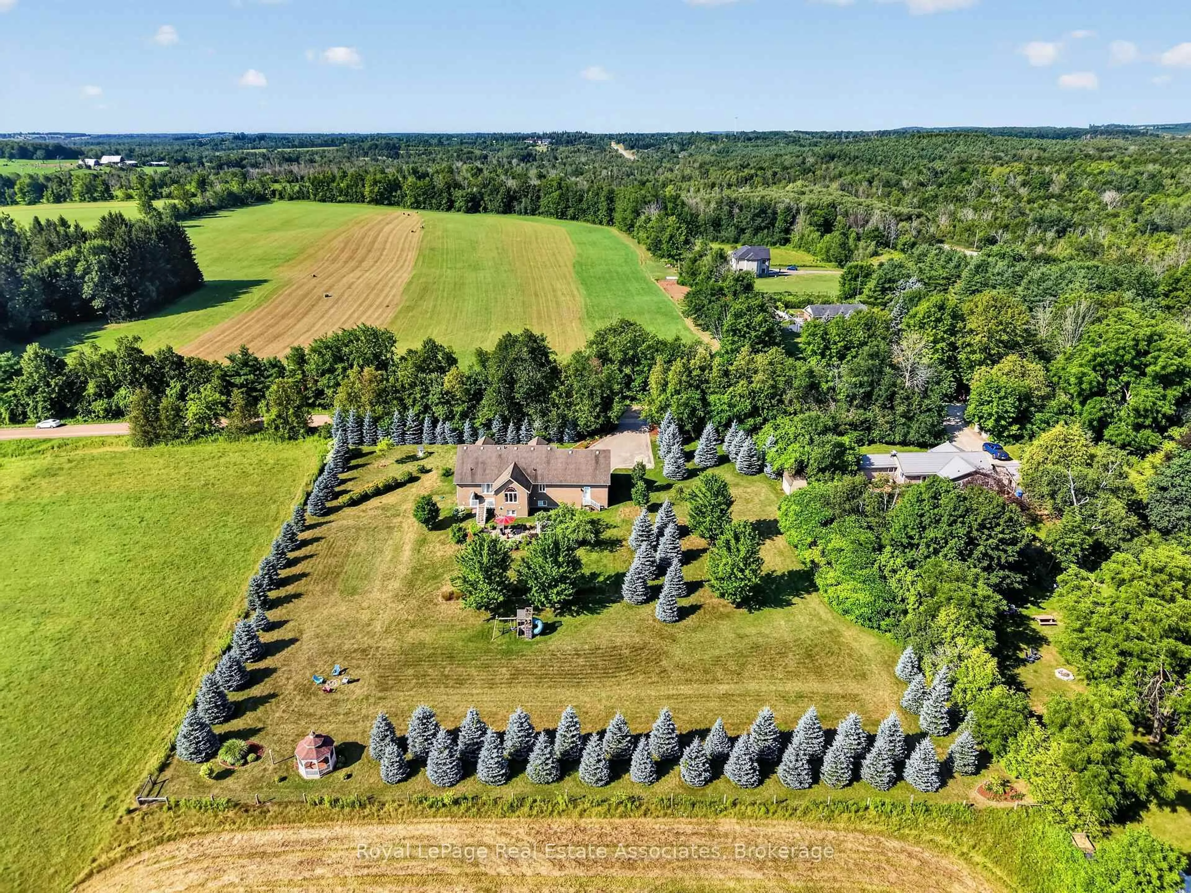 A pic from outside/outdoor area/front of a property/back of a property/a pic from drone, forest/trees view for 5767 Tenth Line, Erin Ontario N0B 1T0