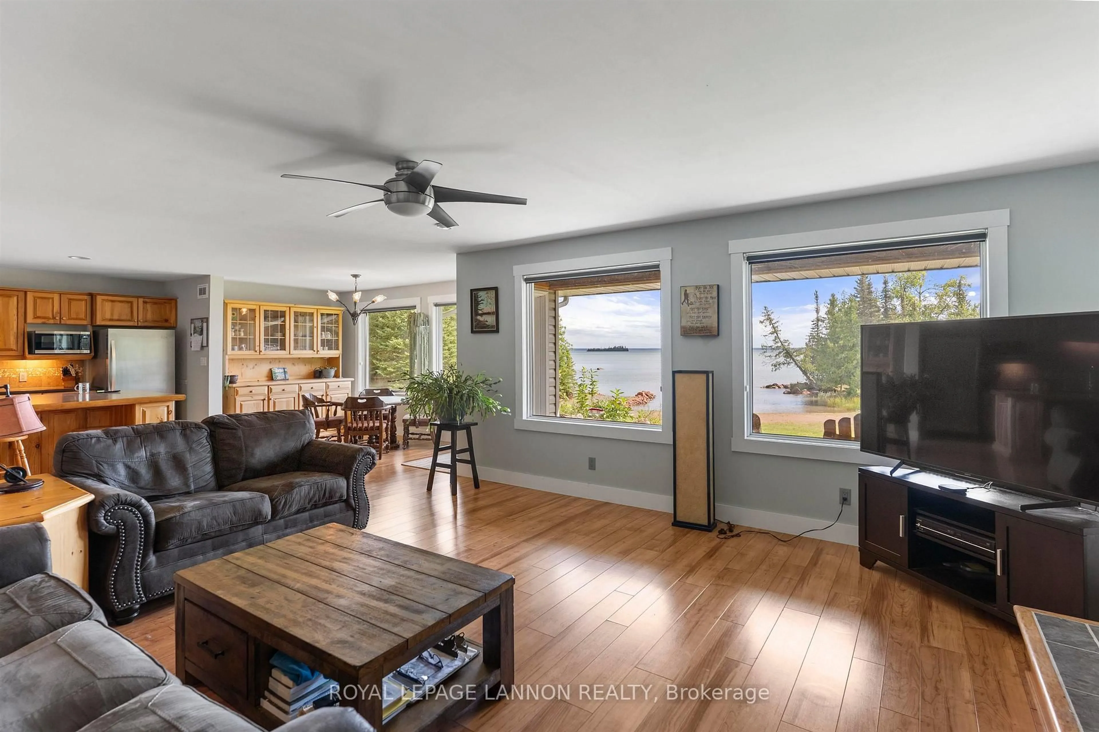 Living room with furniture, wood/laminate floor for 619 Grann Dr, Shuniah Ontario P0T 2M0