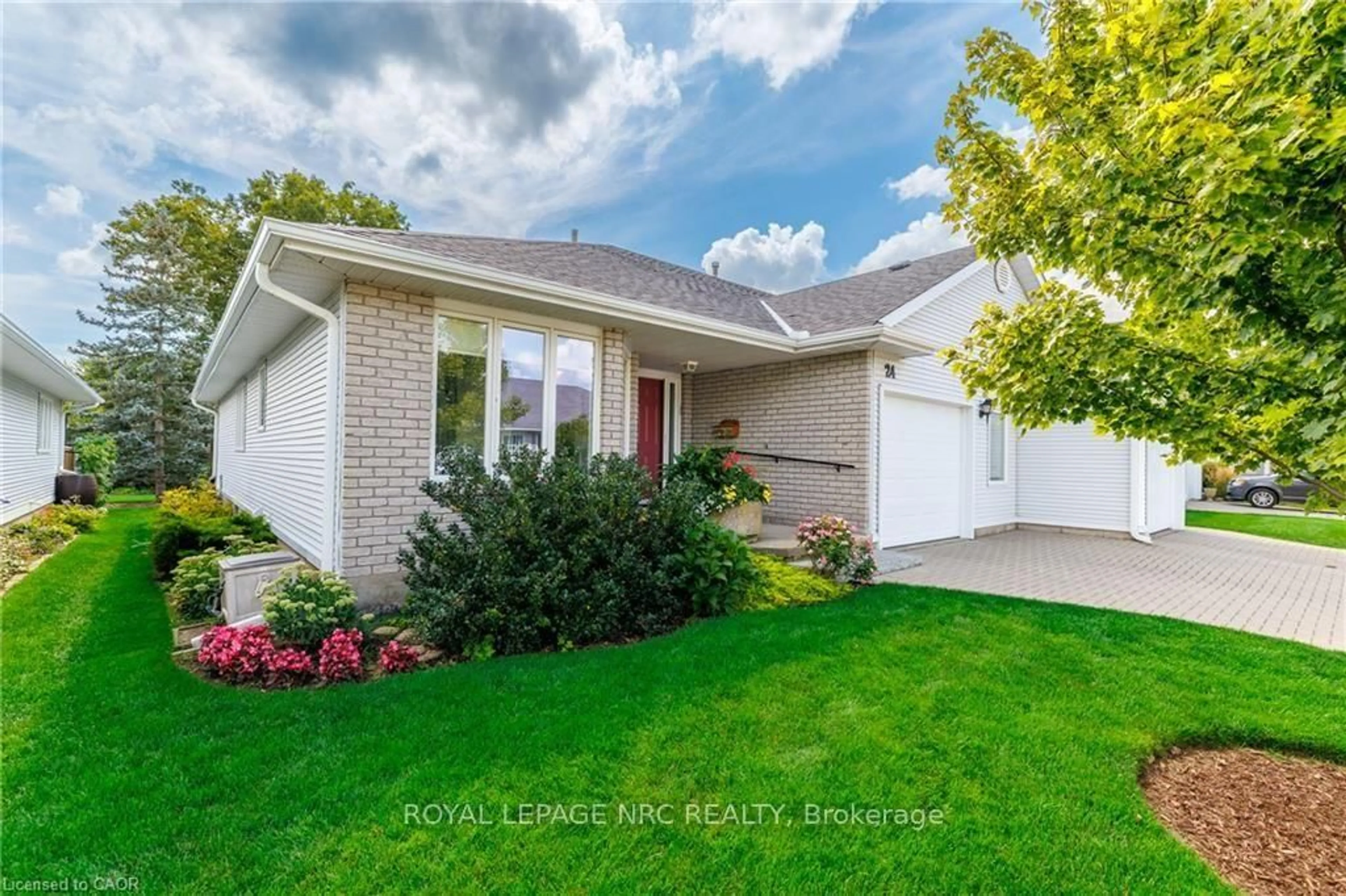 Home with vinyl exterior material, street for 24 Garden Dr #12, West Lincoln Ontario L0R 2A0