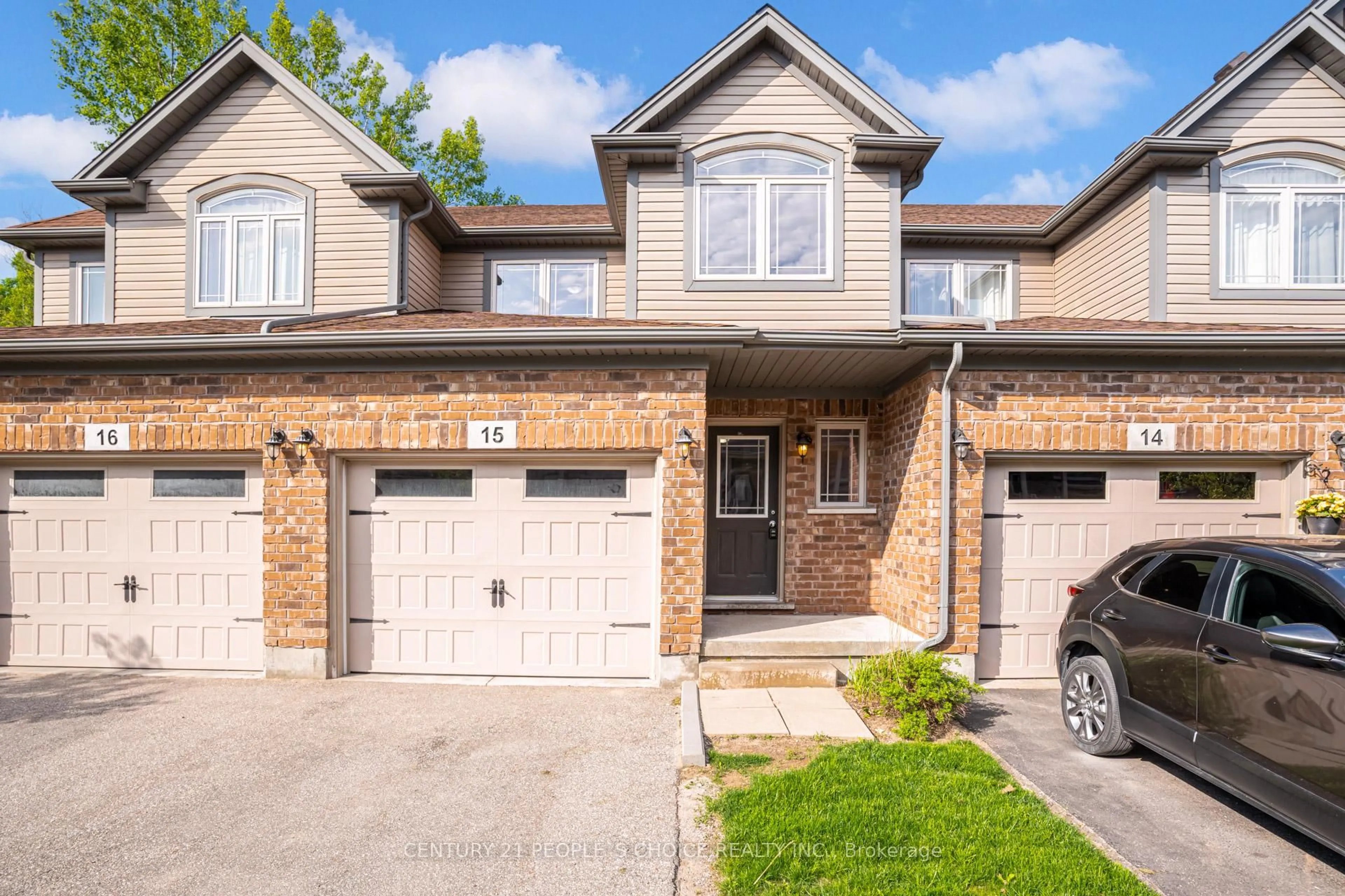Home with brick exterior material, street for 66 Eastview Rd #15, Guelph Ontario N1E 0N1