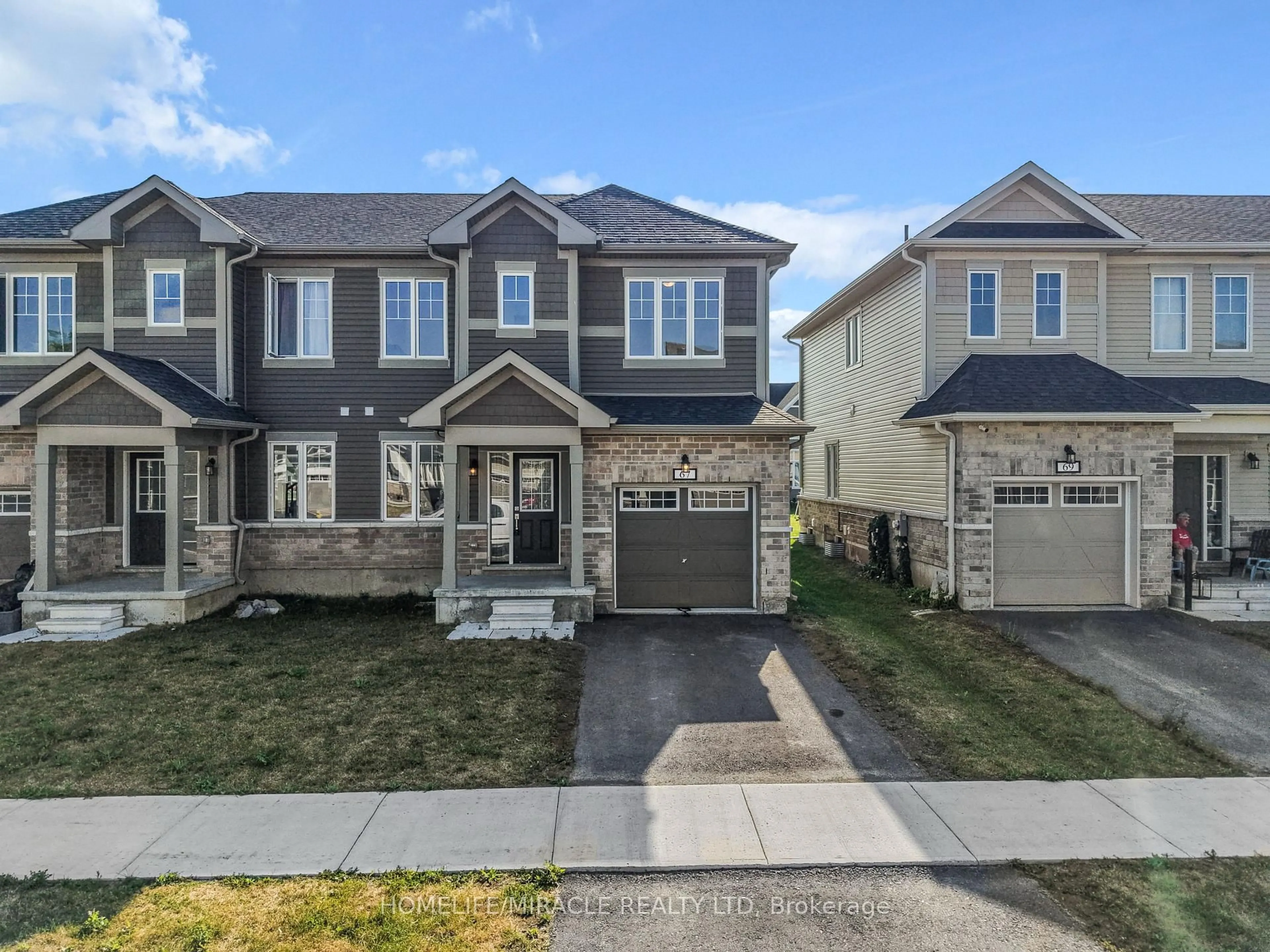 Home with vinyl exterior material, street for 67 Oakmont Dr, Bath Ontario K0H 1G0