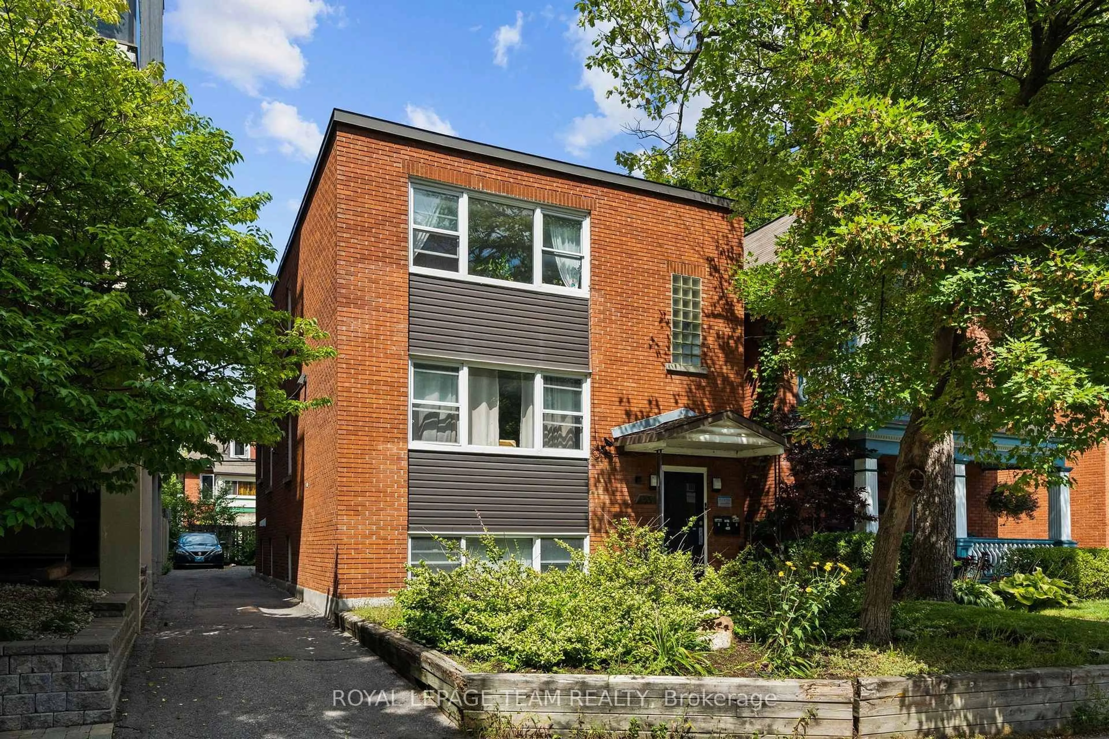 Home with brick exterior material, street for 331 Flora St, Ottawa Ontario K1R 5S1