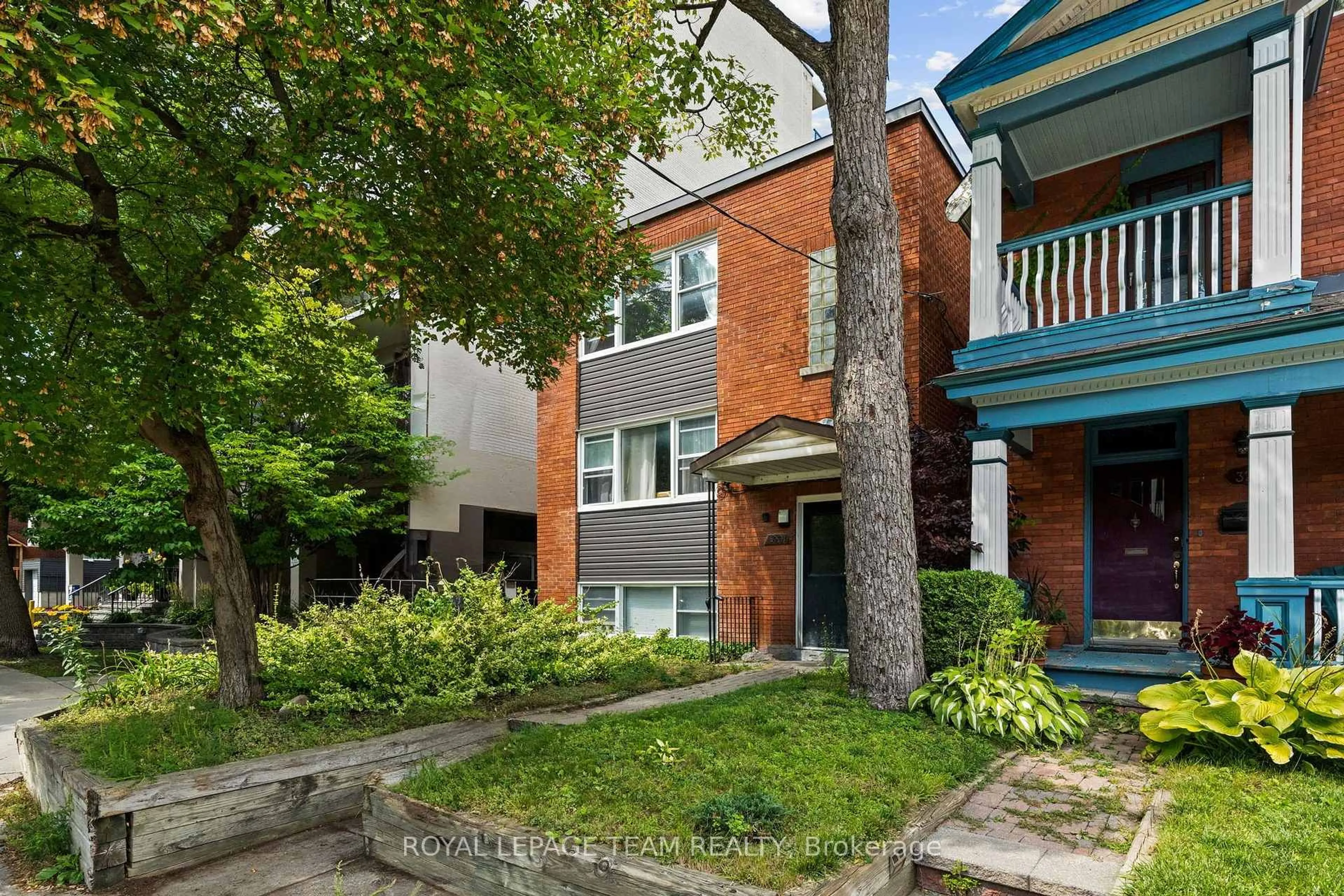 Home with brick exterior material, street for 331 Flora St, Ottawa Ontario K1R 5S1