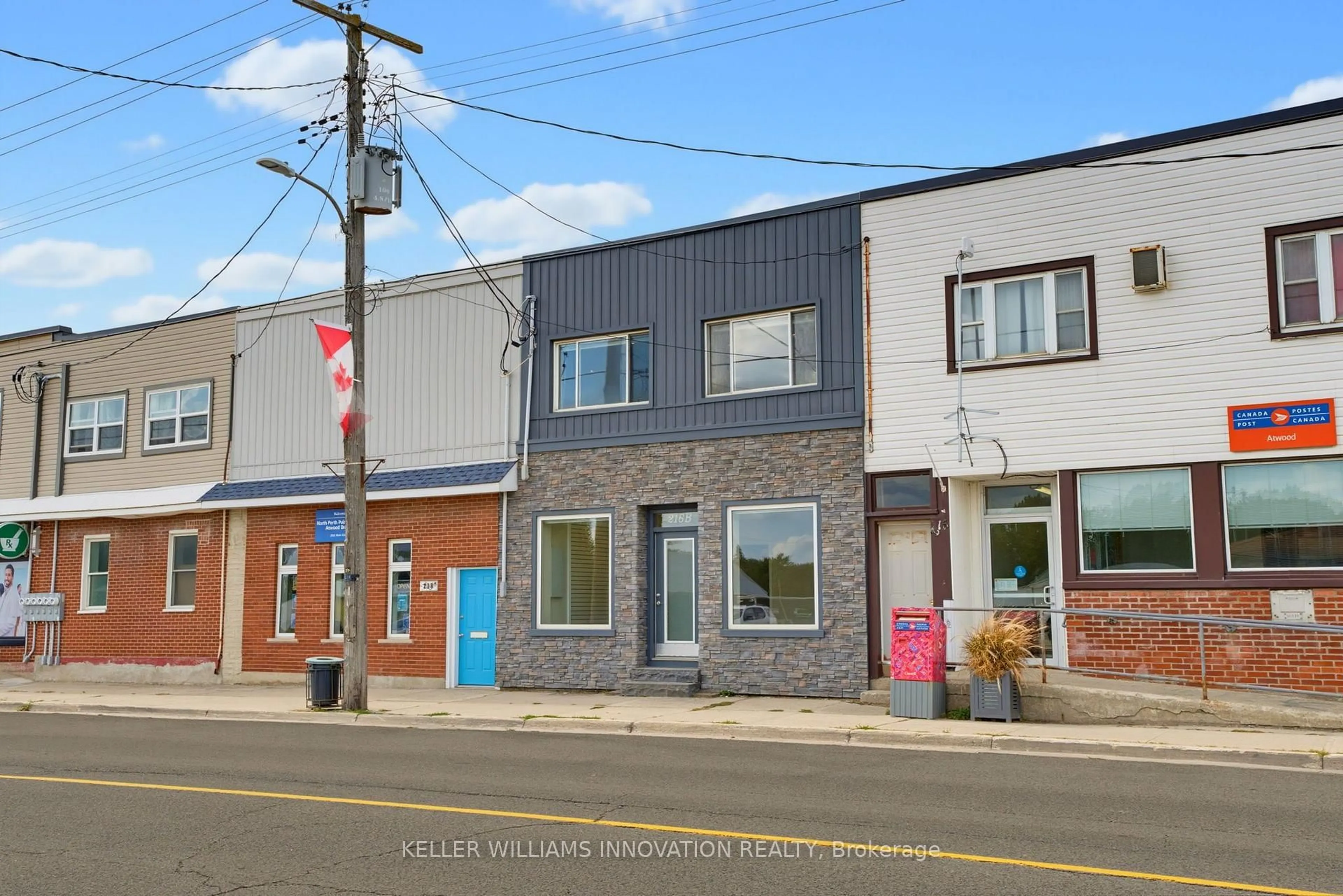 A pic from outside/outdoor area/front of a property/back of a property/a pic from drone, street for 216B Main St, North Perth Ontario N0G 1B0