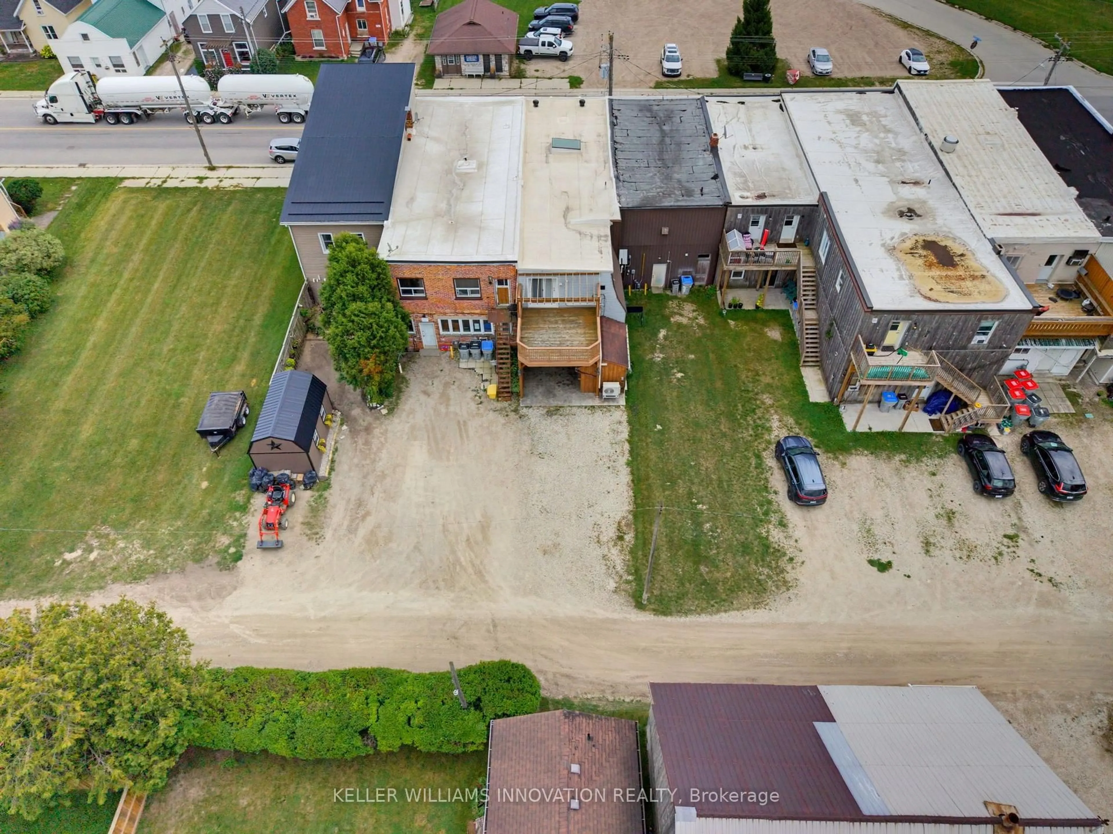 A pic from outside/outdoor area/front of a property/back of a property/a pic from drone, street for 216B Main St, North Perth Ontario N0G 1B0