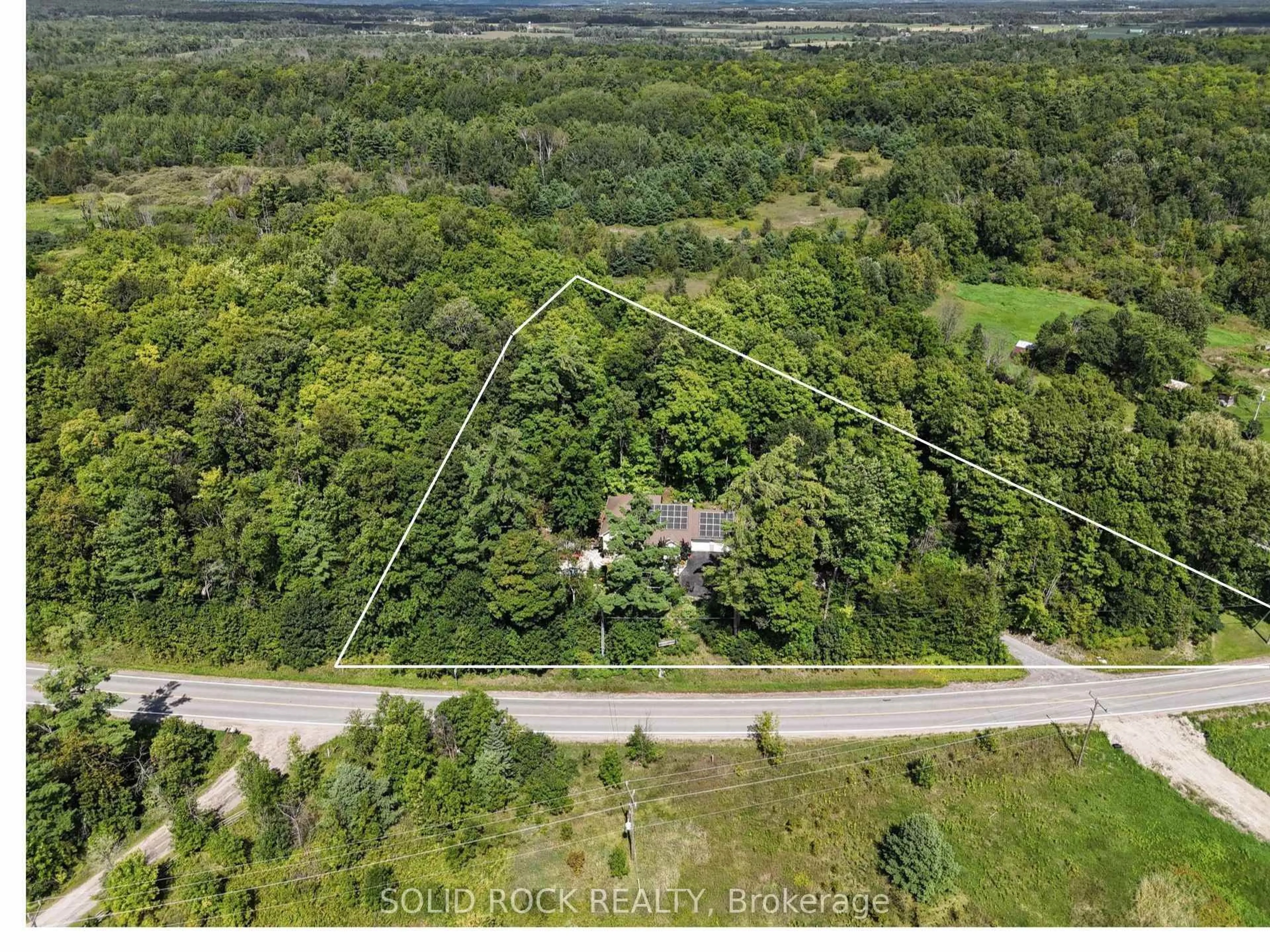 A pic from outside/outdoor area/front of a property/back of a property/a pic from drone, forest/trees view for 712 Flat Rapids Rd, Arnprior Ontario K7S 3G8