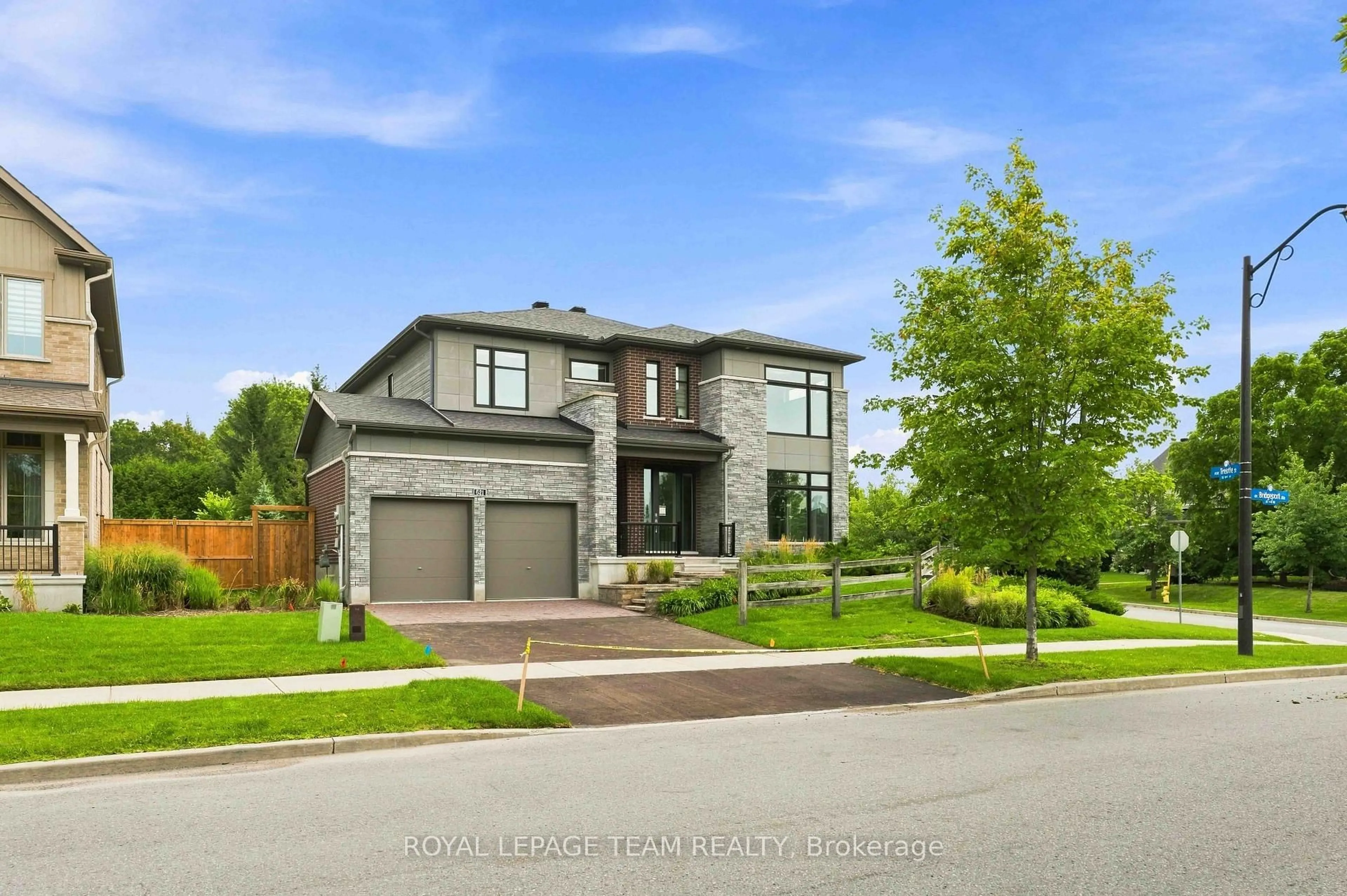Home with brick exterior material, street for 521 Bridgeport Ave, Ottawa Ontario K4M 0E9