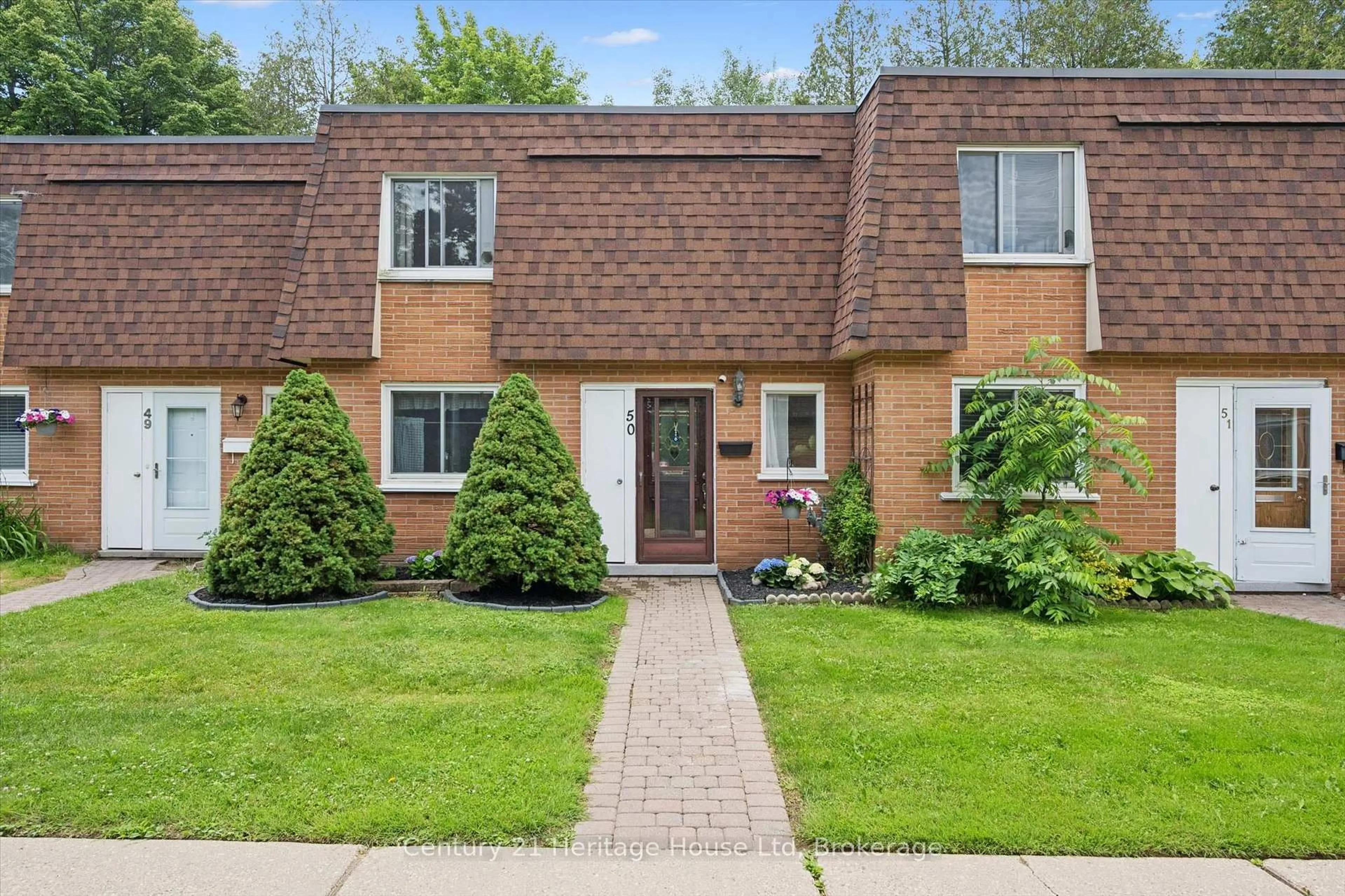 Home with brick exterior material, street for 120 Country Club Dr #50, Guelph Ontario N1E 3K7
