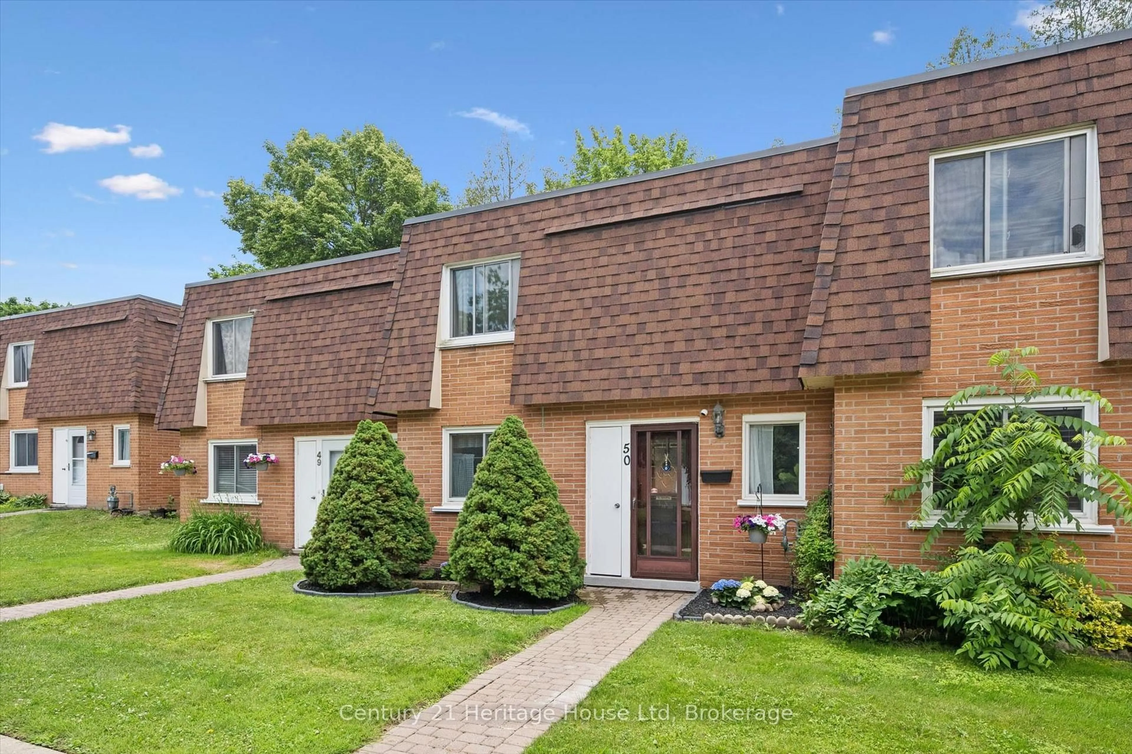 Home with brick exterior material, street for 120 Country Club Dr #50, Guelph Ontario N1E 3K7