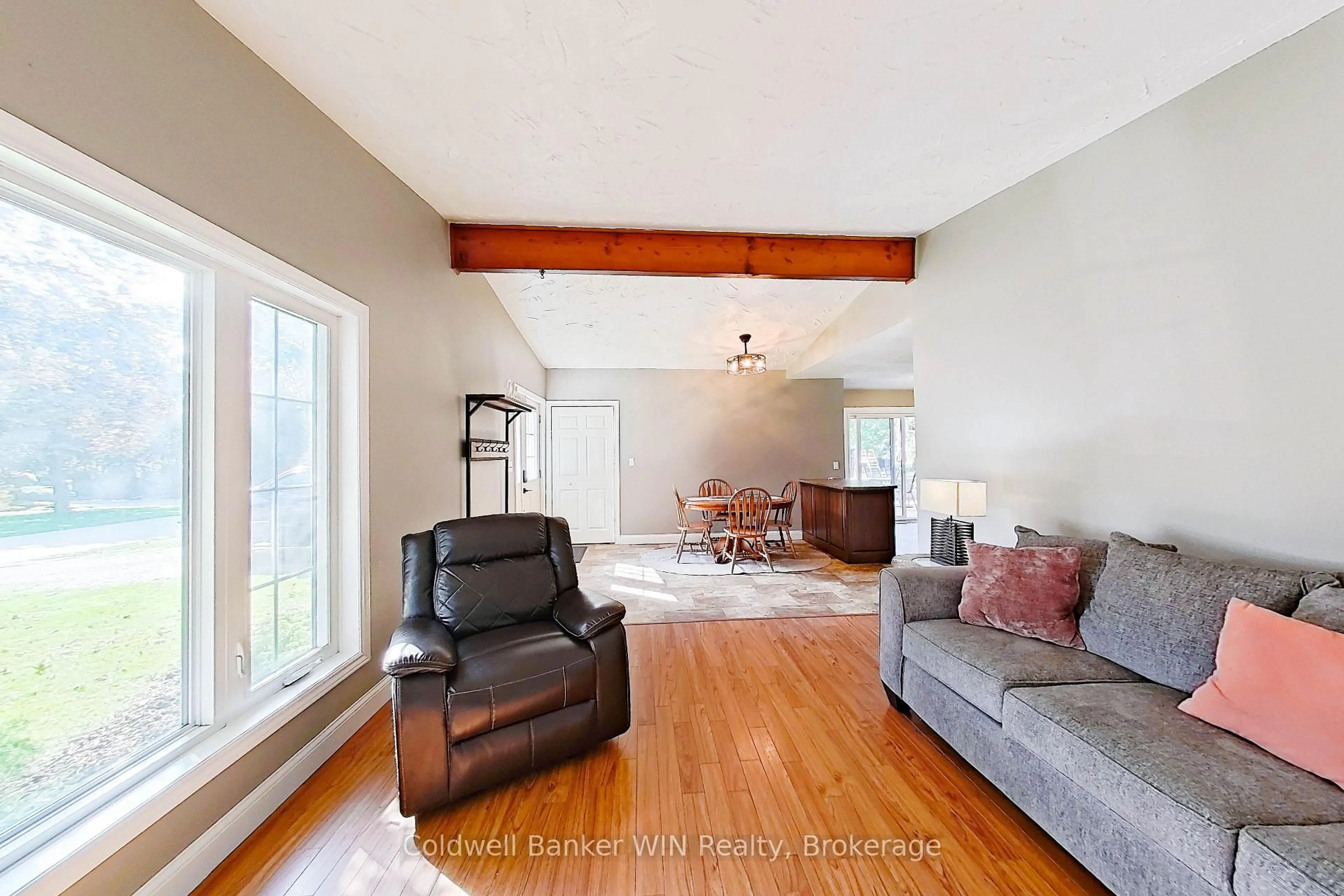 Living room with furniture, wood/laminate floor for 25 Thomas St, South Bruce Ontario N0G 2S0
