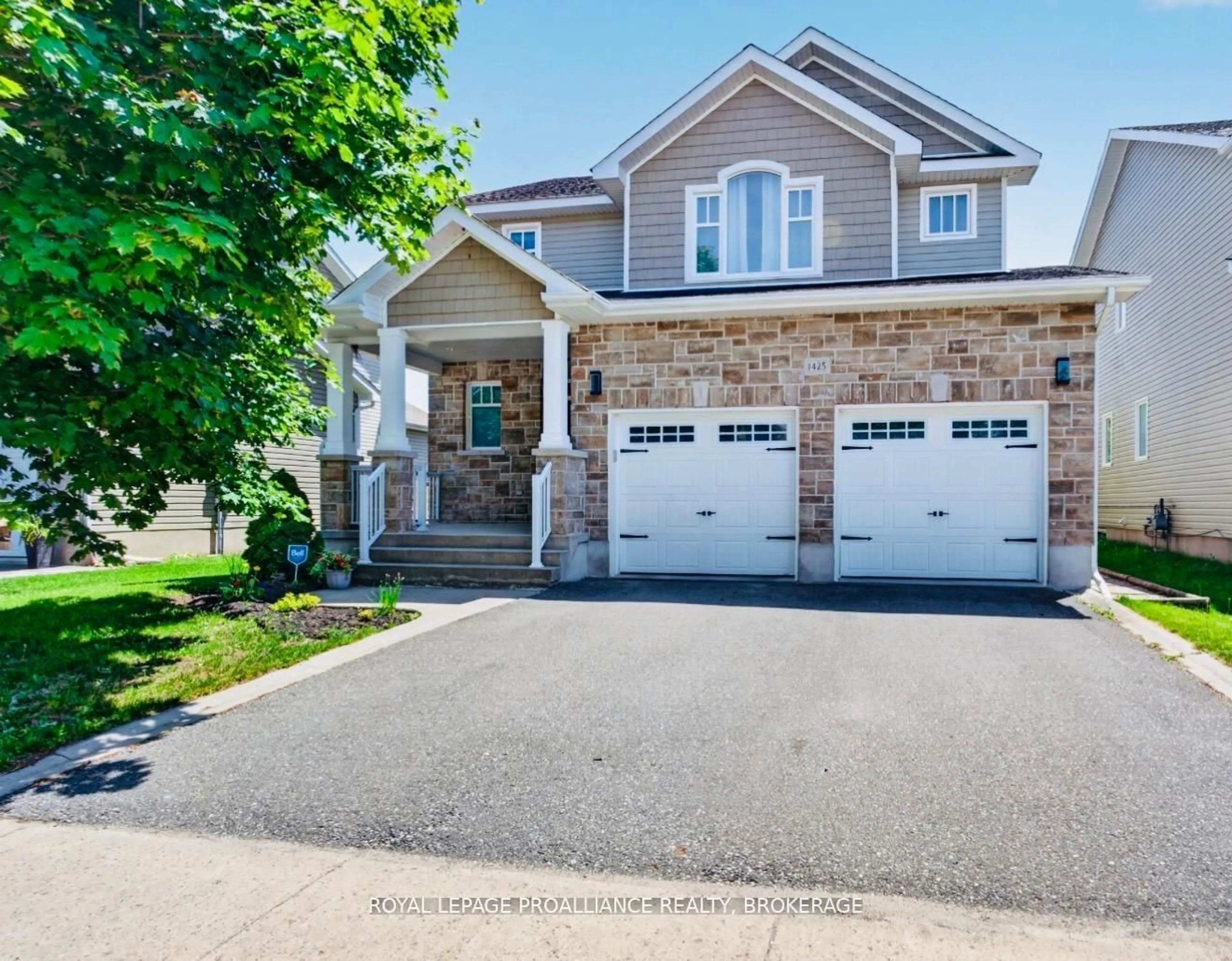 Home with brick exterior material, street for 1425 Evergreen Dr, Kingston Ontario K7P 0H5